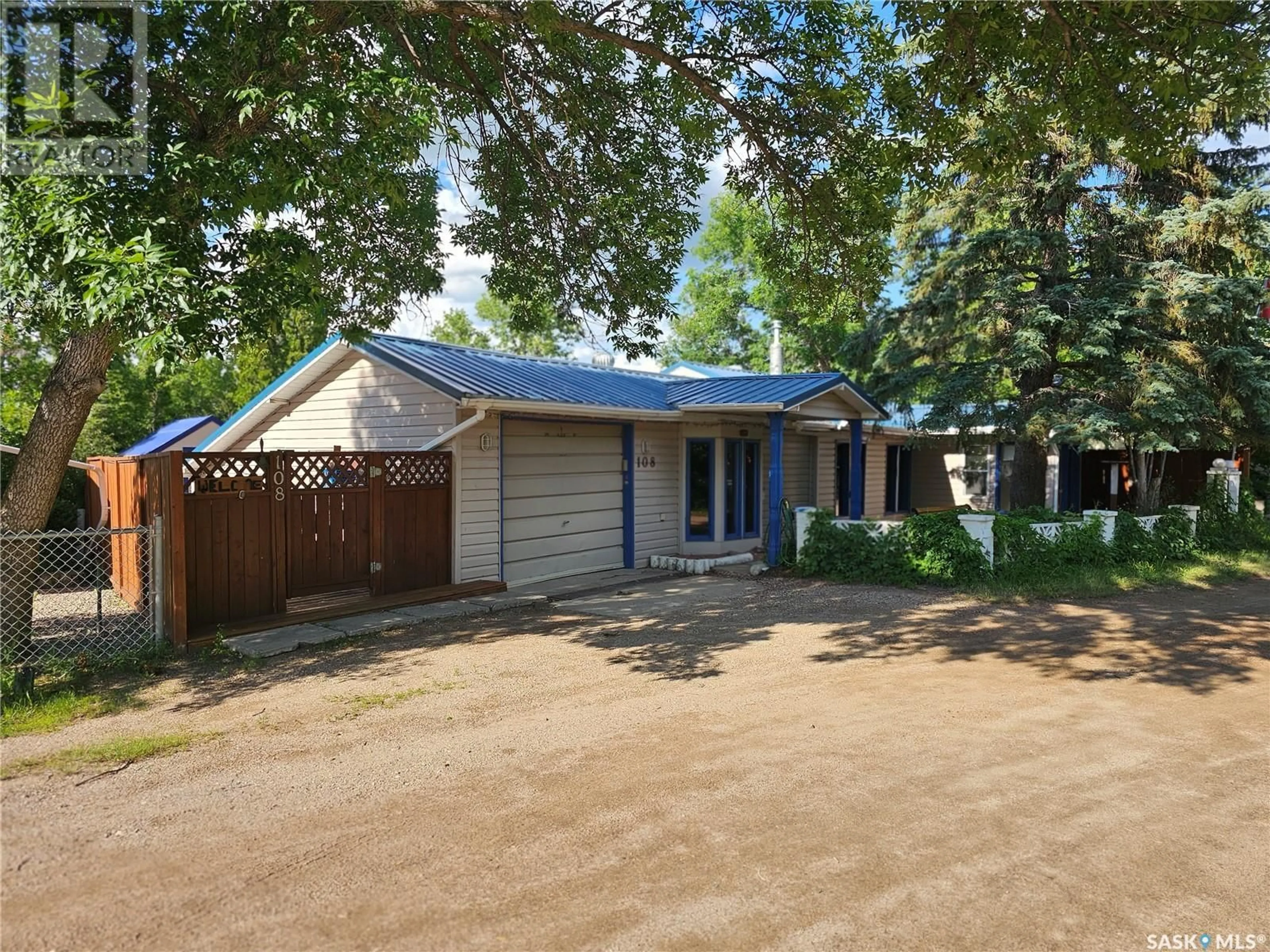 A pic from outside/outdoor area/front of a property/back of a property/a pic from drone, street for 108 BRIERE DRIVE, Regina Beach Saskatchewan S0G4C0