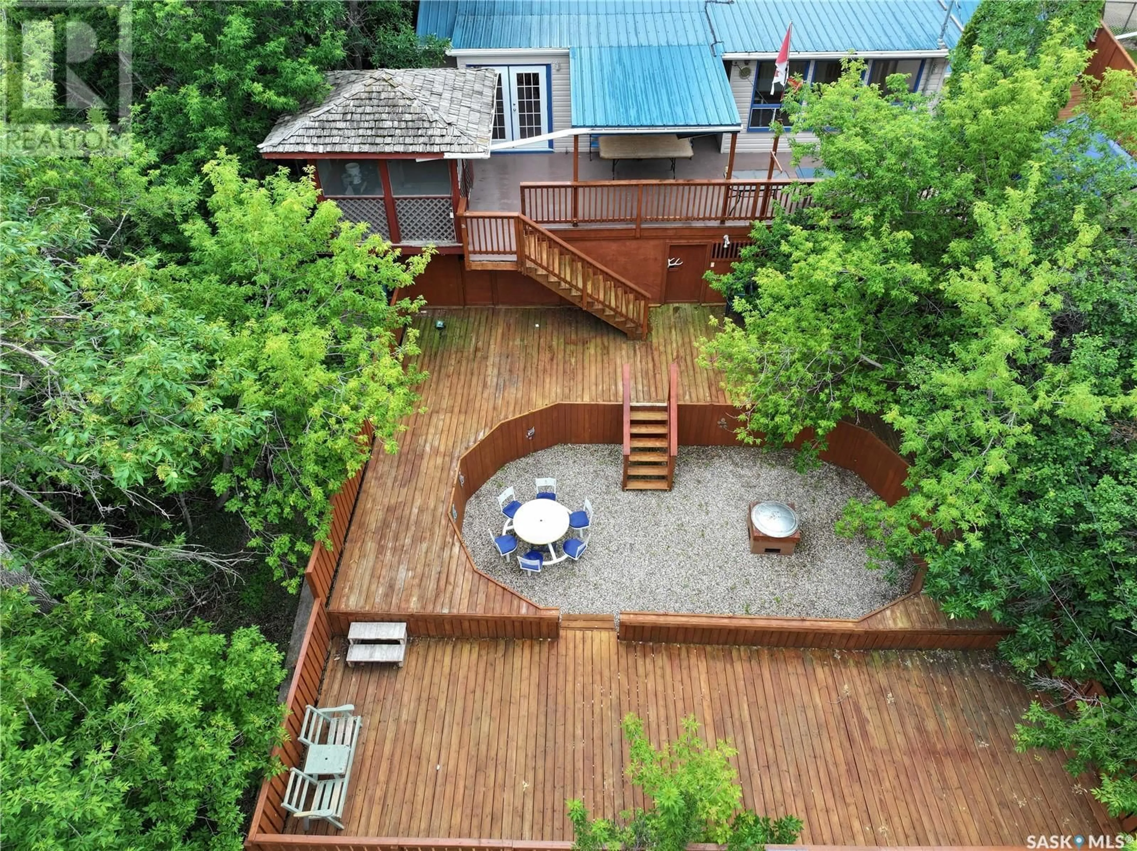 A pic from outside/outdoor area/front of a property/back of a property/a pic from drone, unknown for 108 BRIERE DRIVE, Regina Beach Saskatchewan S0G4C0