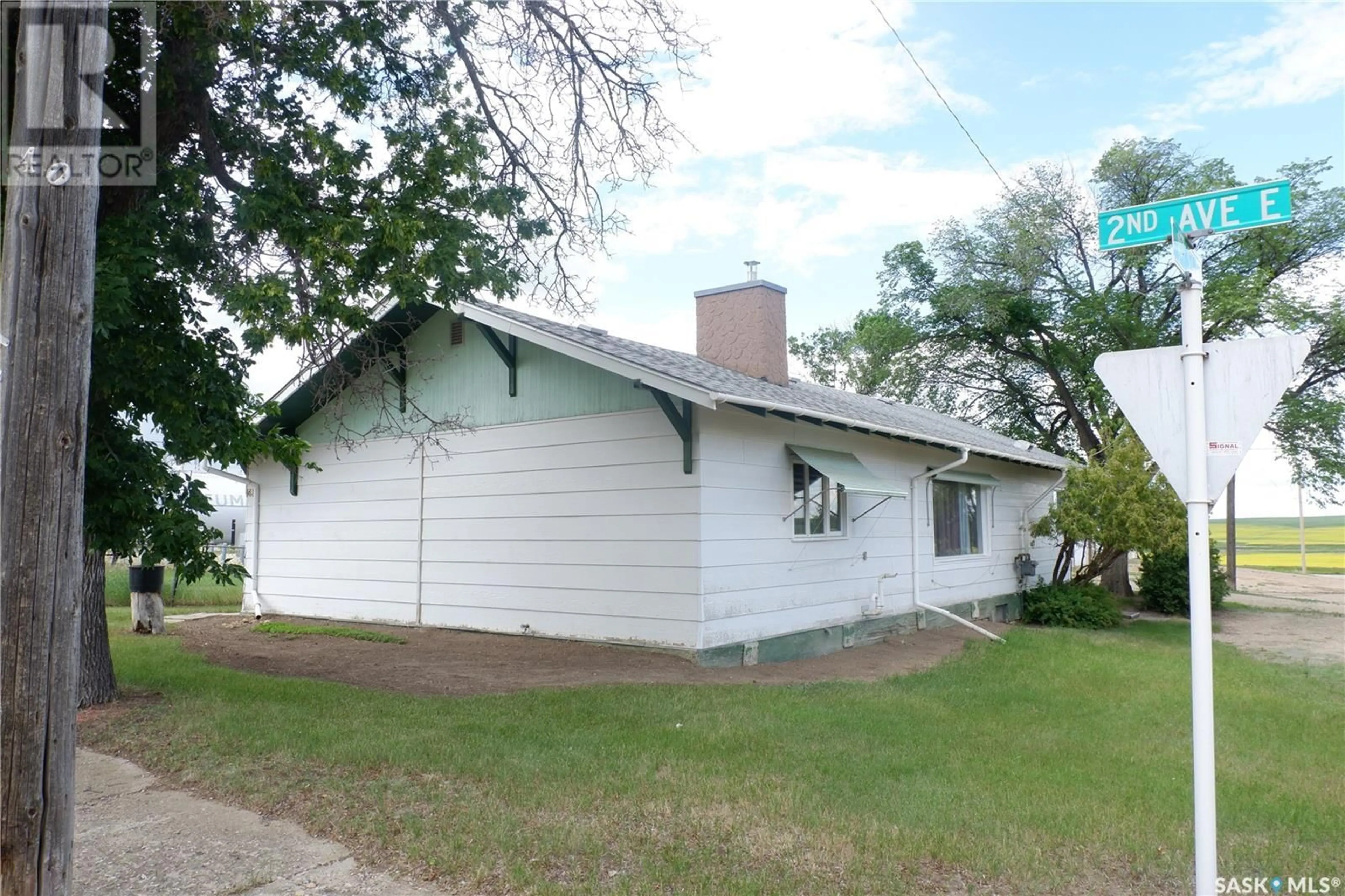 Home with vinyl exterior material, street for 48 2ND AVENUE, Lafleche Saskatchewan S0H2K0