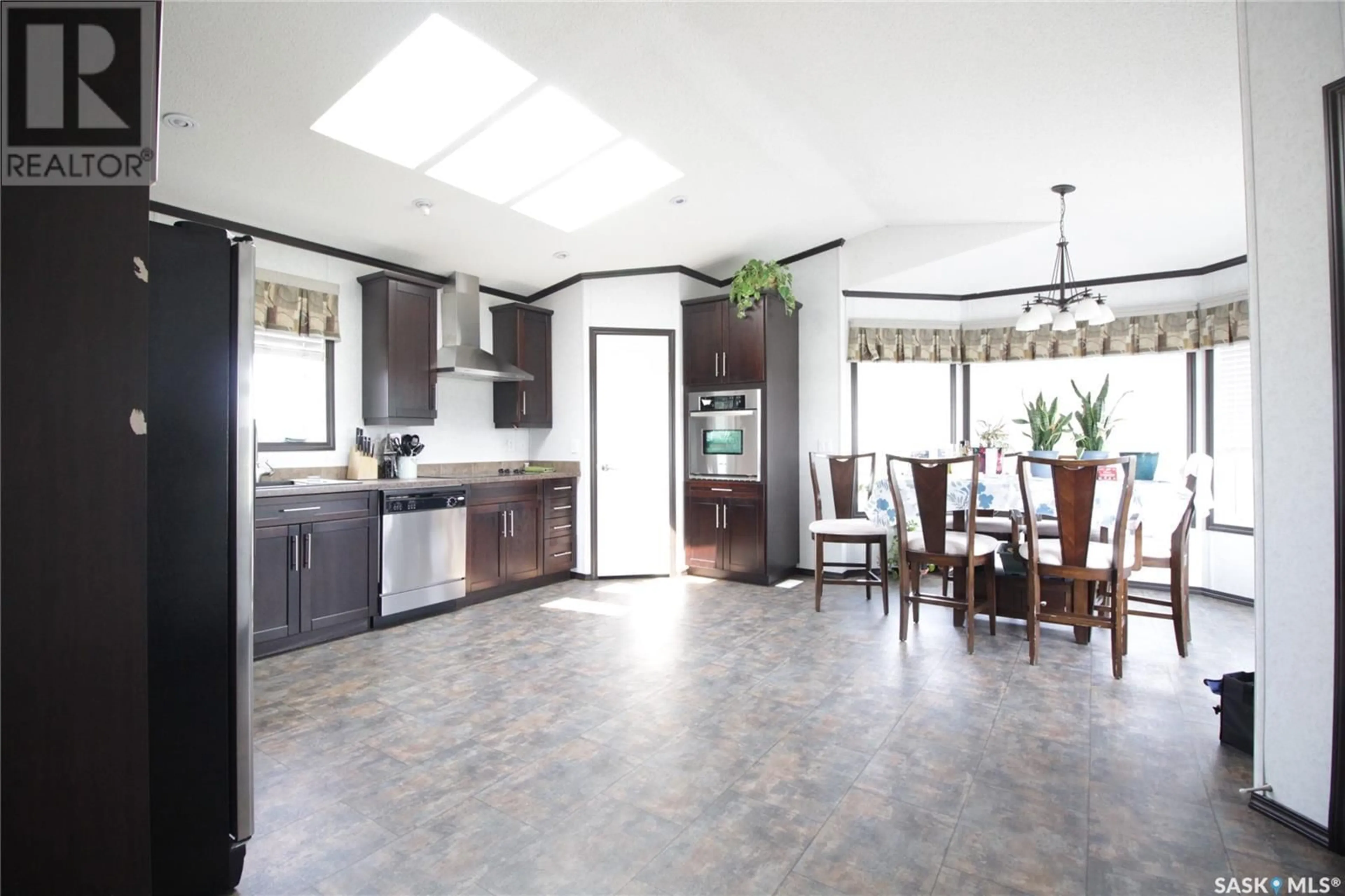 Open concept kitchen, ceramic/tile floor for 1249 AUTUMN COURT, Rocanville Saskatchewan S0A3L0