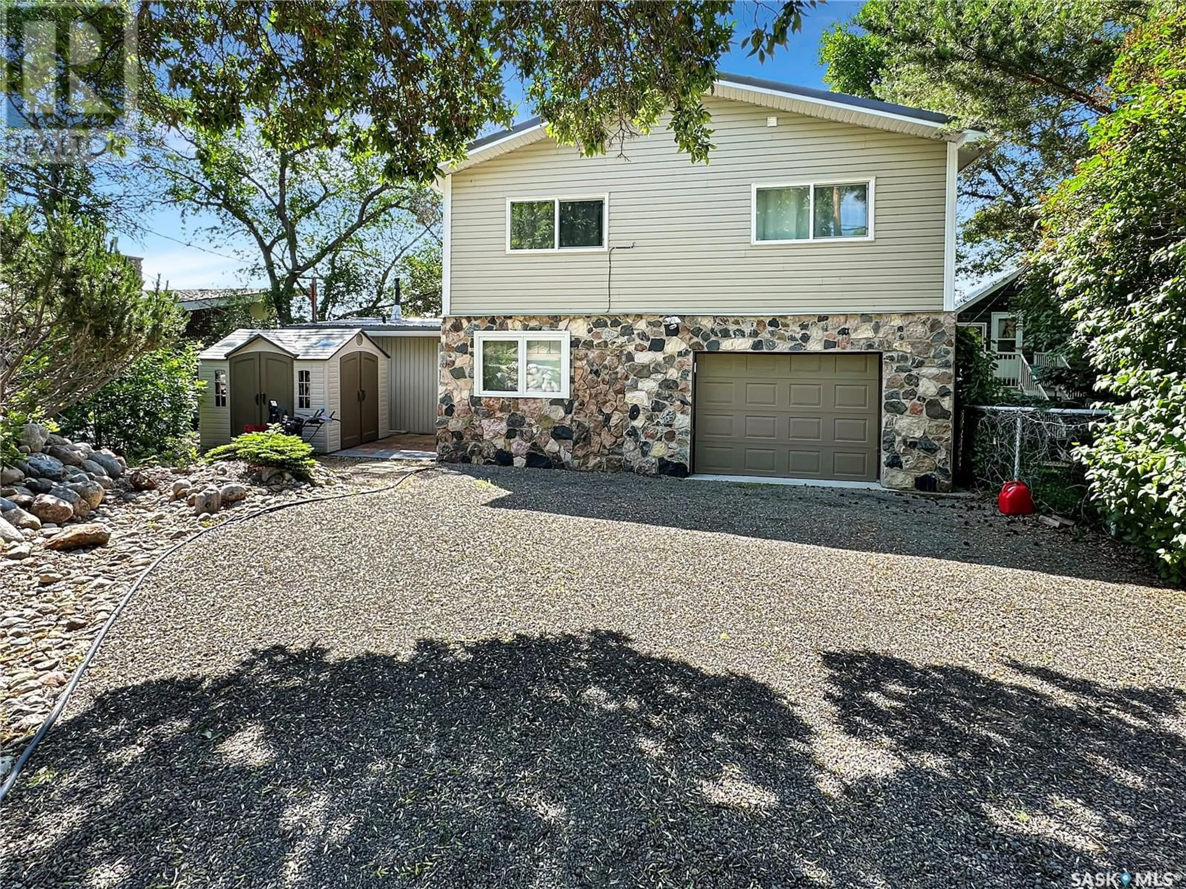 Home with vinyl exterior material, street for 402 PASQUA LAKE ROAD, North Qu'Appelle Rm No. 187 Saskatchewan S0G1S0