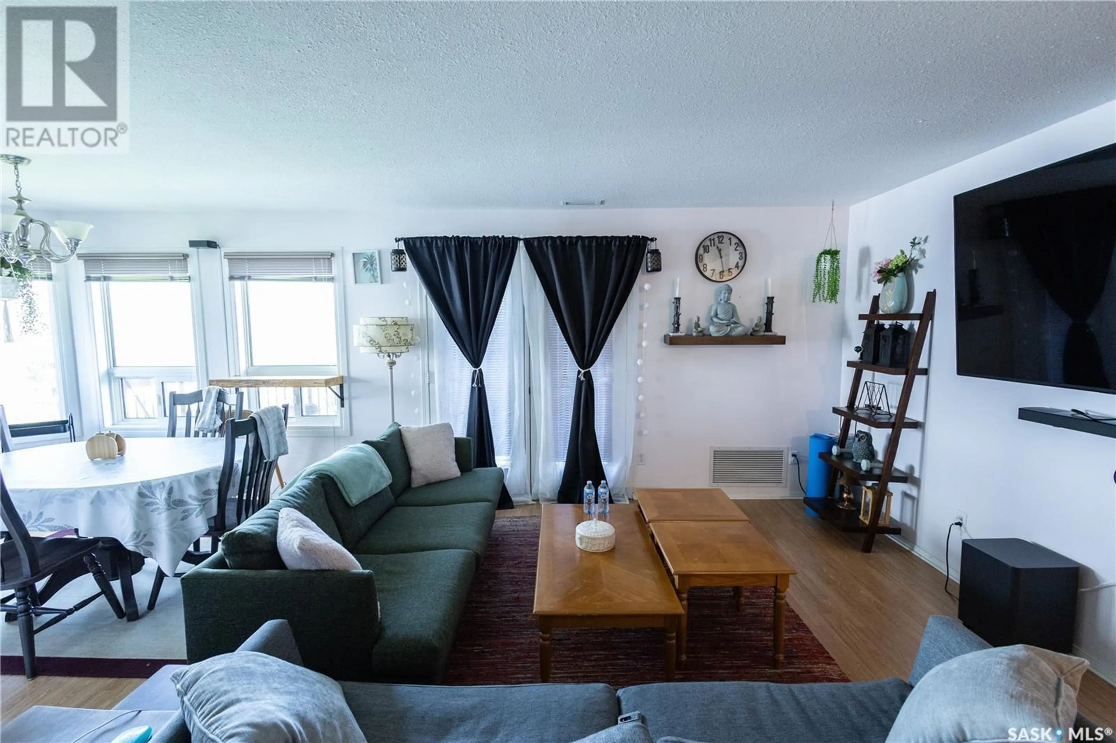 Living room with furniture, wood/laminate floor for C2 - 532 RIVER STREET, Prince Albert Saskatchewan S6V0A6