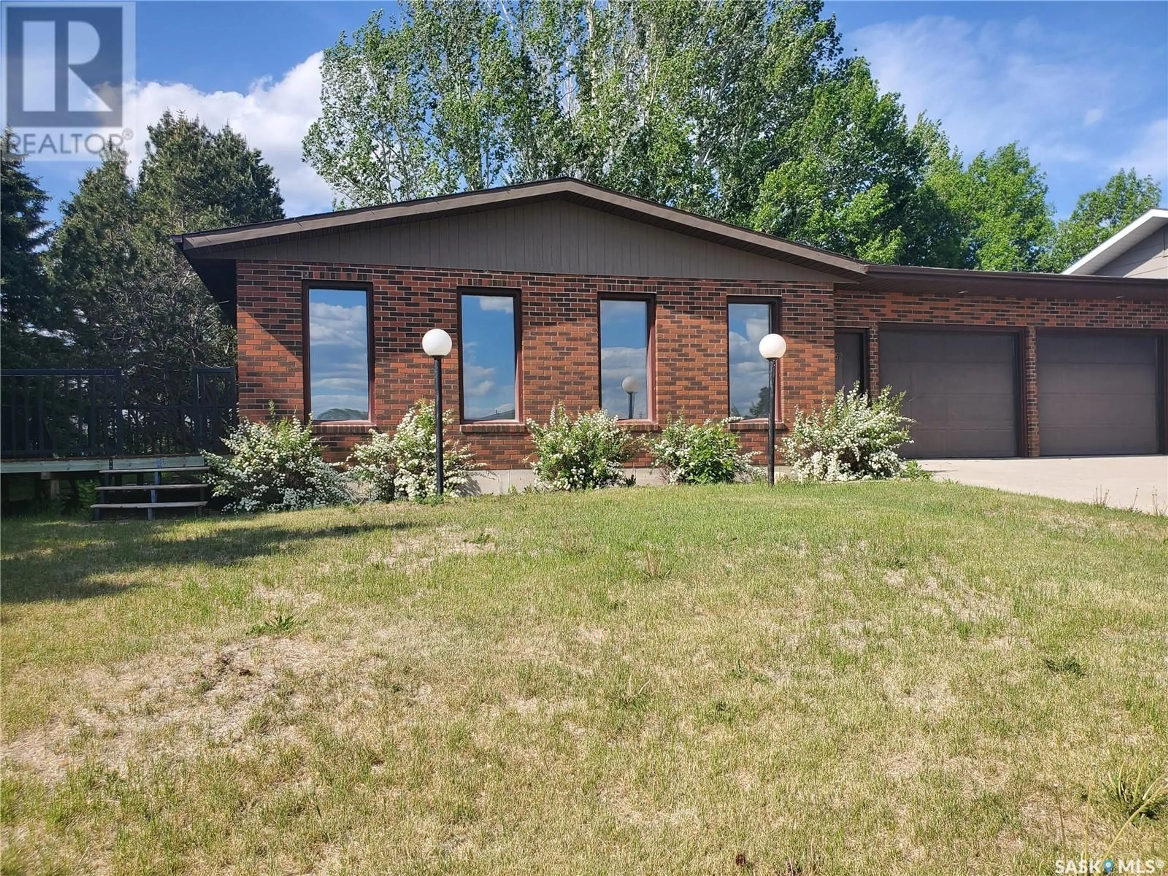 Home with brick exterior material, street for 52 BANKS CRESCENT, Kamsack Saskatchewan S0A1S0