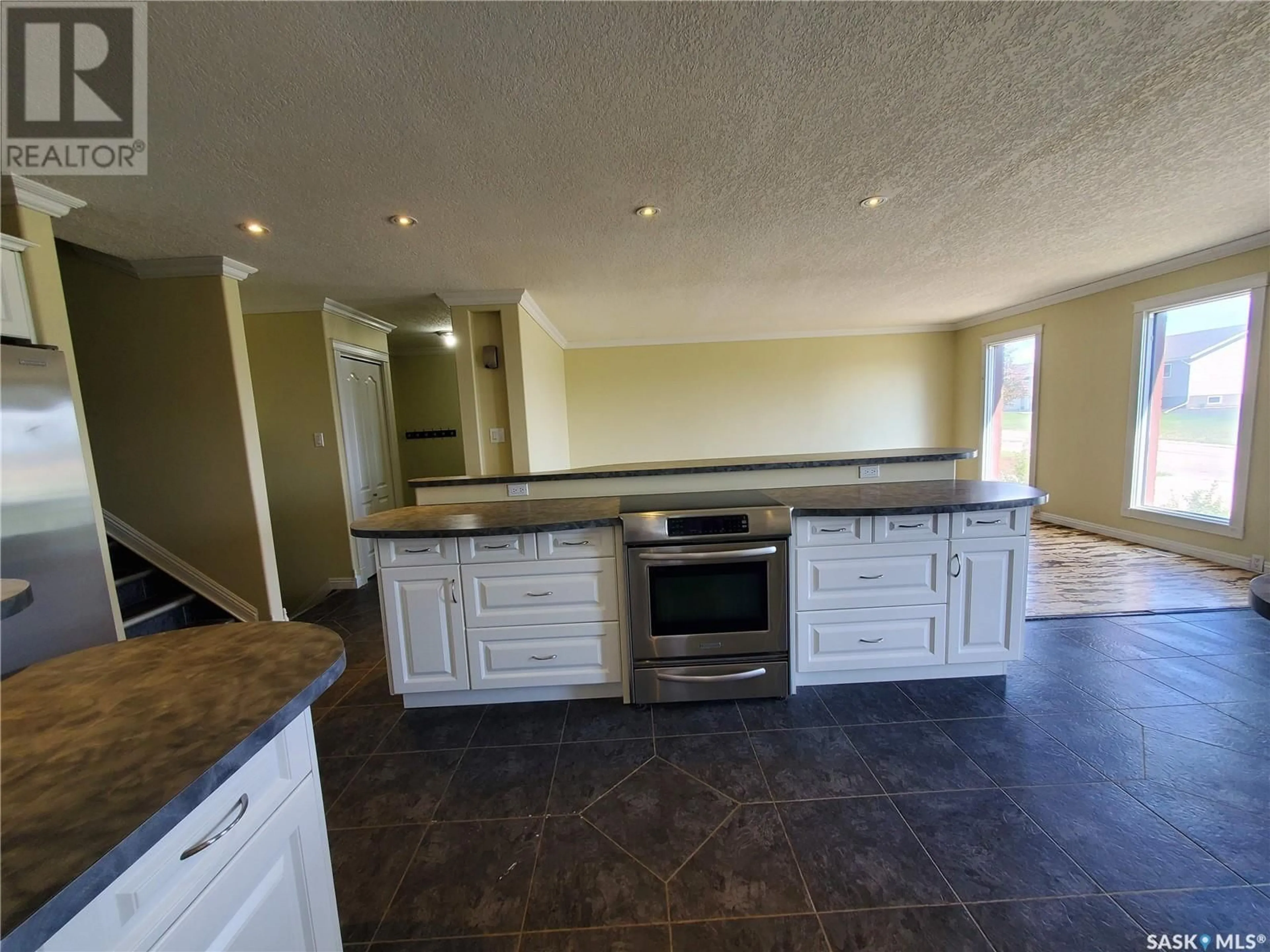 Open concept kitchen, ceramic/tile floor for 52 BANKS CRESCENT, Kamsack Saskatchewan S0A1S0