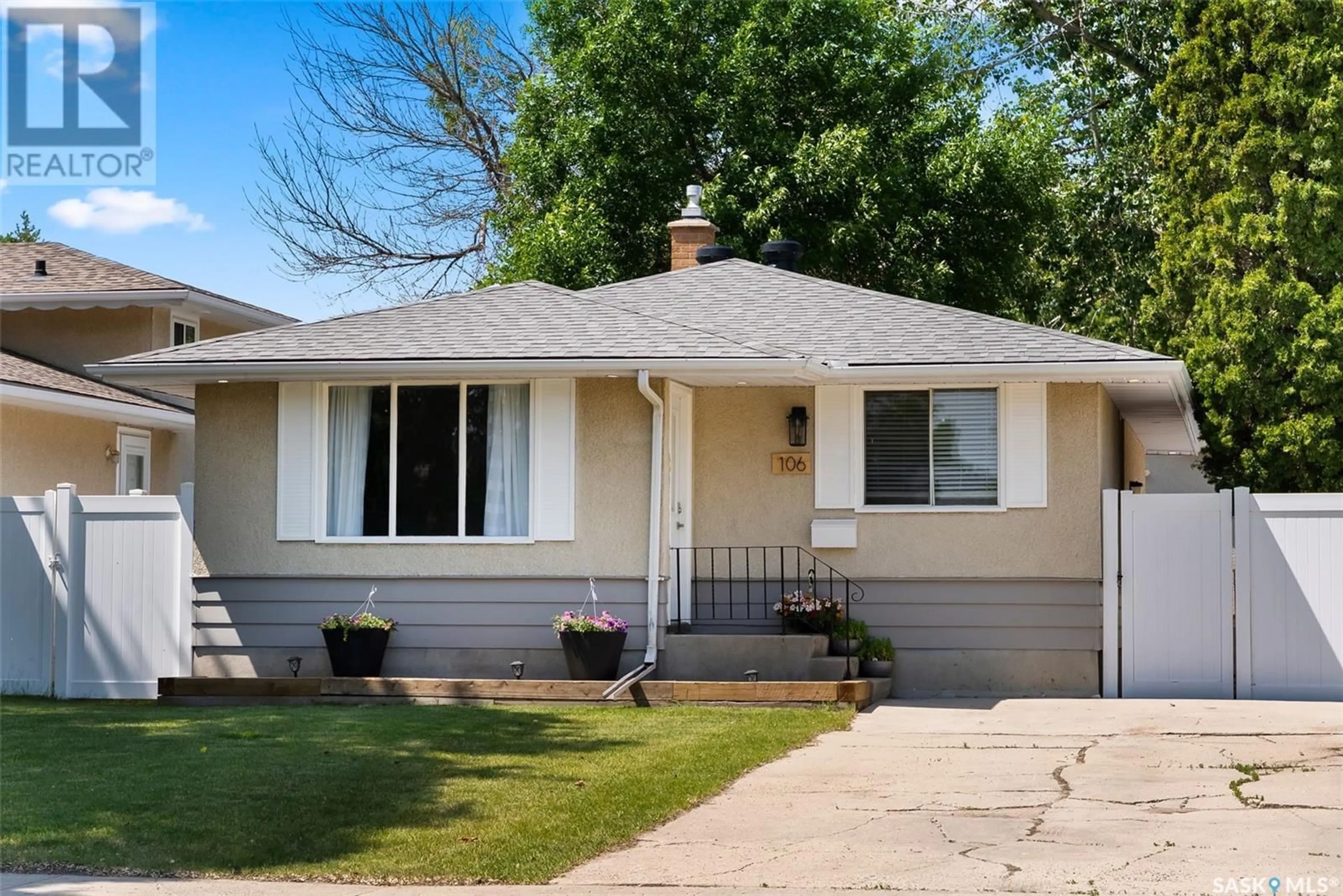 Home with vinyl exterior material, street for 106 WELLS STREET, Regina Saskatchewan S4R5M7