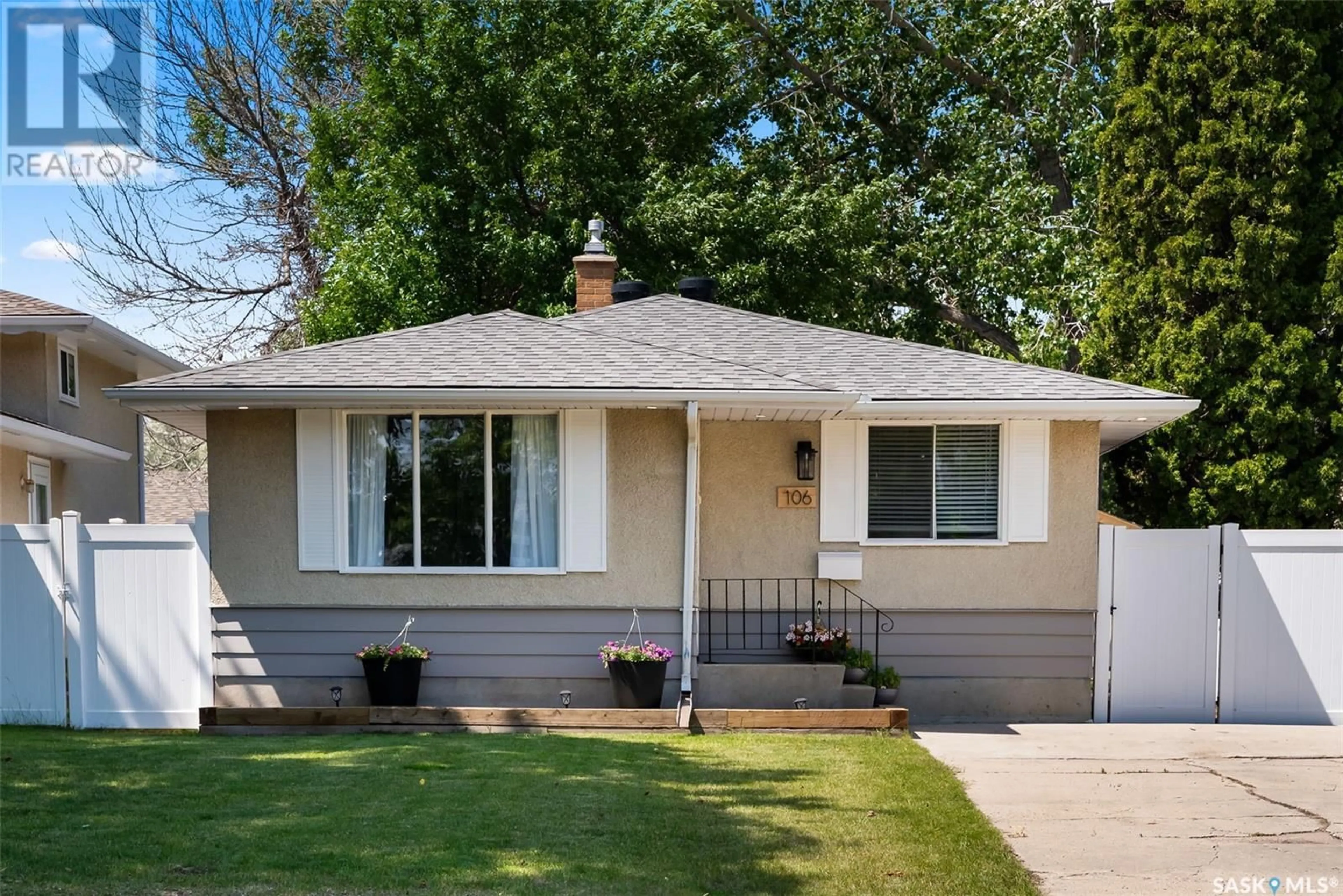 Home with vinyl exterior material, street for 106 WELLS STREET, Regina Saskatchewan S4R5M7