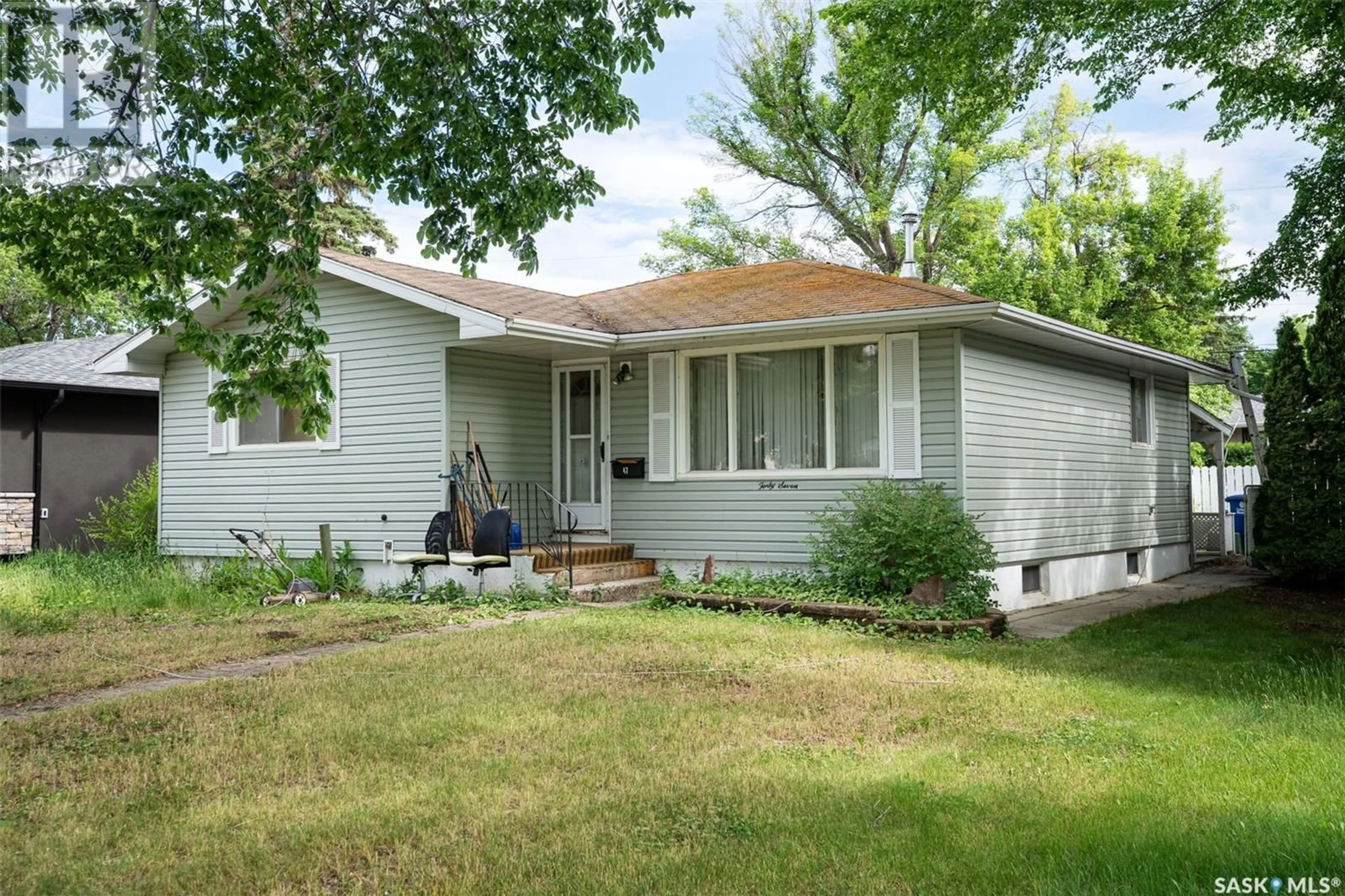 Home with vinyl exterior material, street for 47 BELL CRESCENT, Saskatoon Saskatchewan S7J2W2