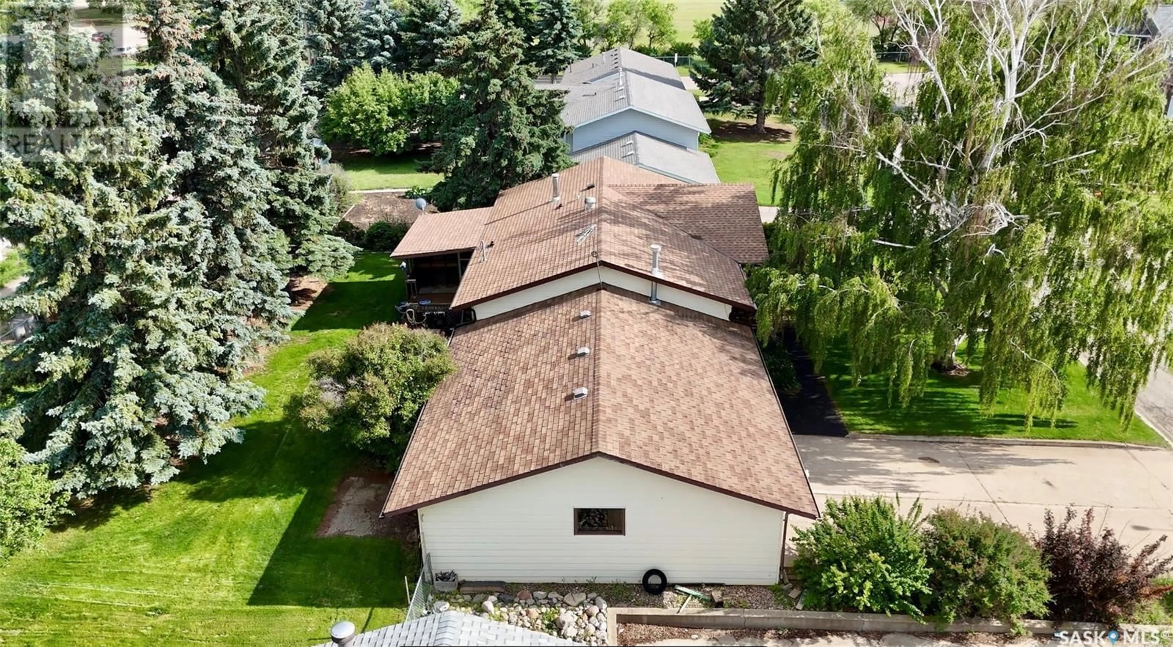 A pic from outside/outdoor area/front of a property/back of a property/a pic from drone, building for 521 HEARN STREET, Outlook Saskatchewan S0L2N0