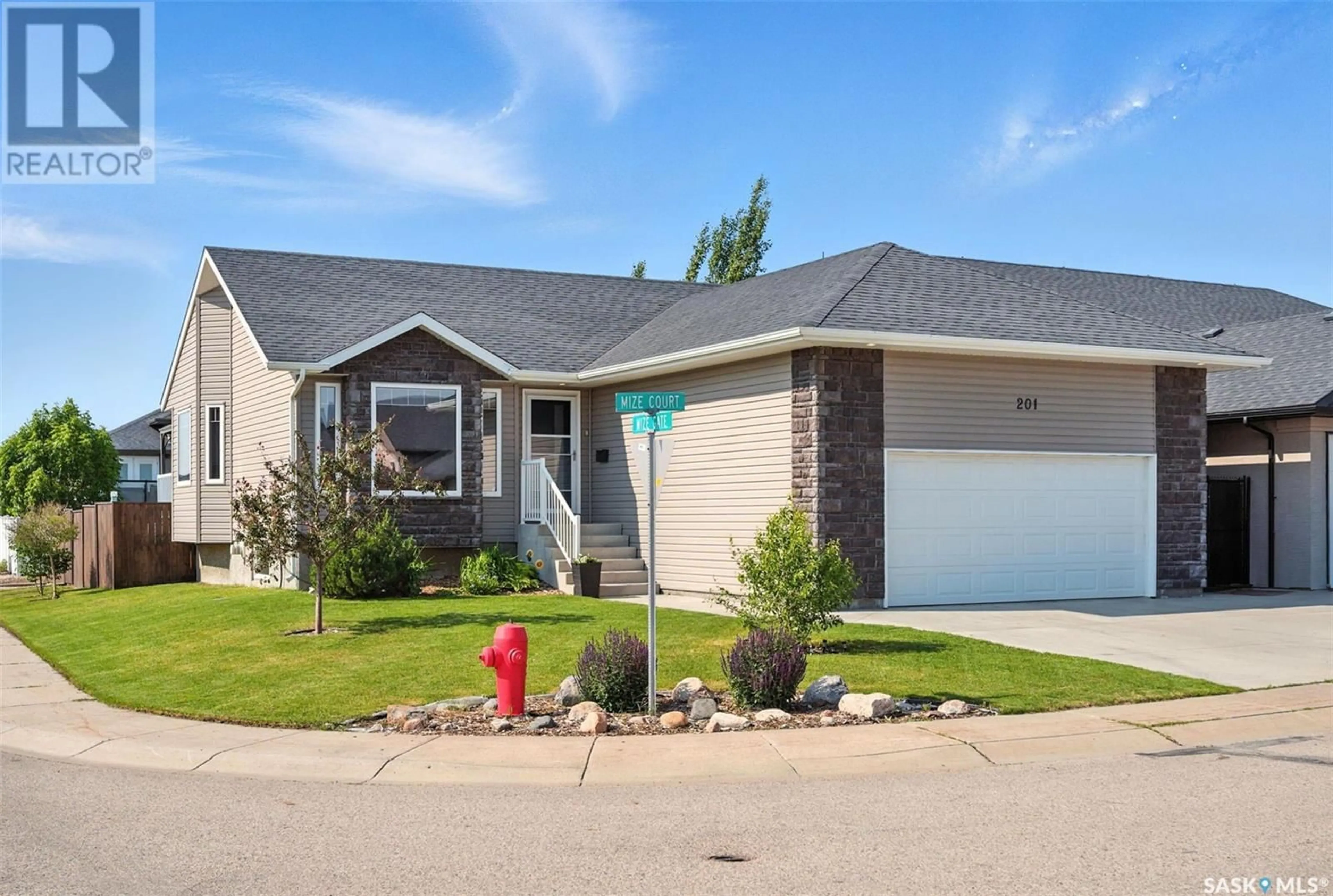 Home with vinyl exterior material, street for 201 MIZE COURT, Warman Saskatchewan S0K4S1