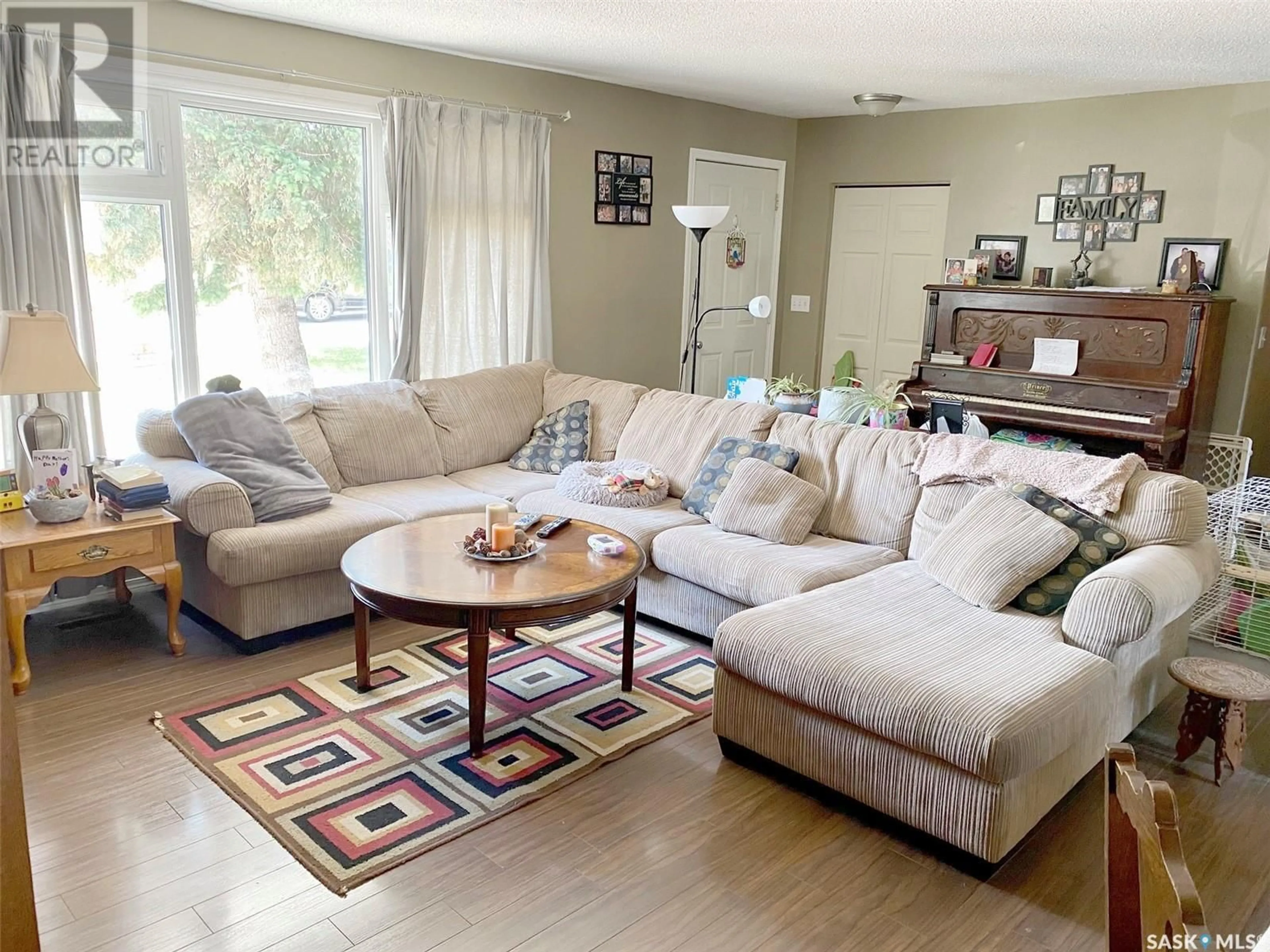 Living room with furniture, unknown for 105 ASSINIBOIA AVENUE, Assiniboia Saskatchewan S0H0B0