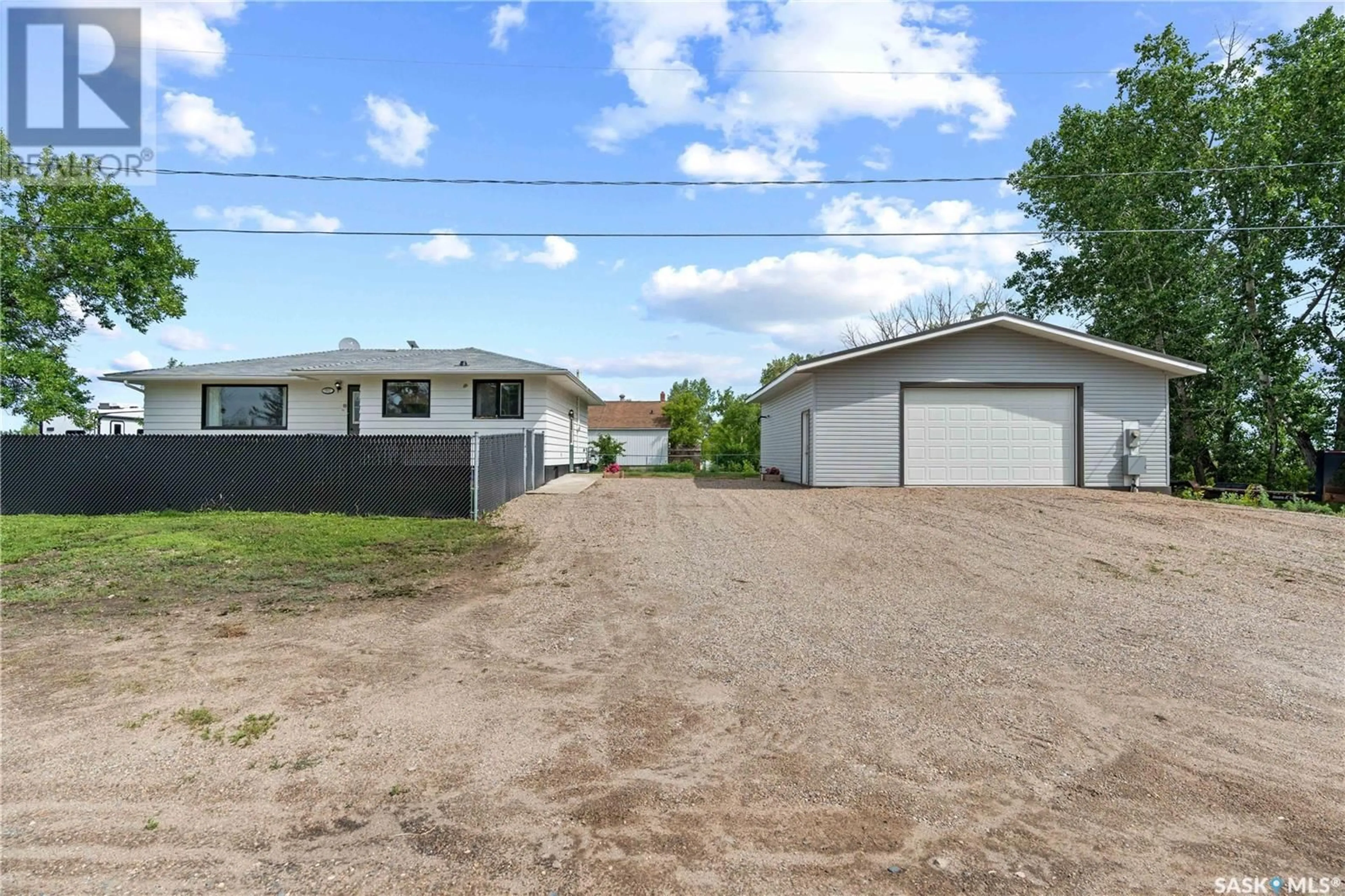 A pic from outside/outdoor area/front of a property/back of a property/a pic from drone, street for 302 FIRST STREET, Dufferin Rm No. 190 Saskatchewan S0G1P0