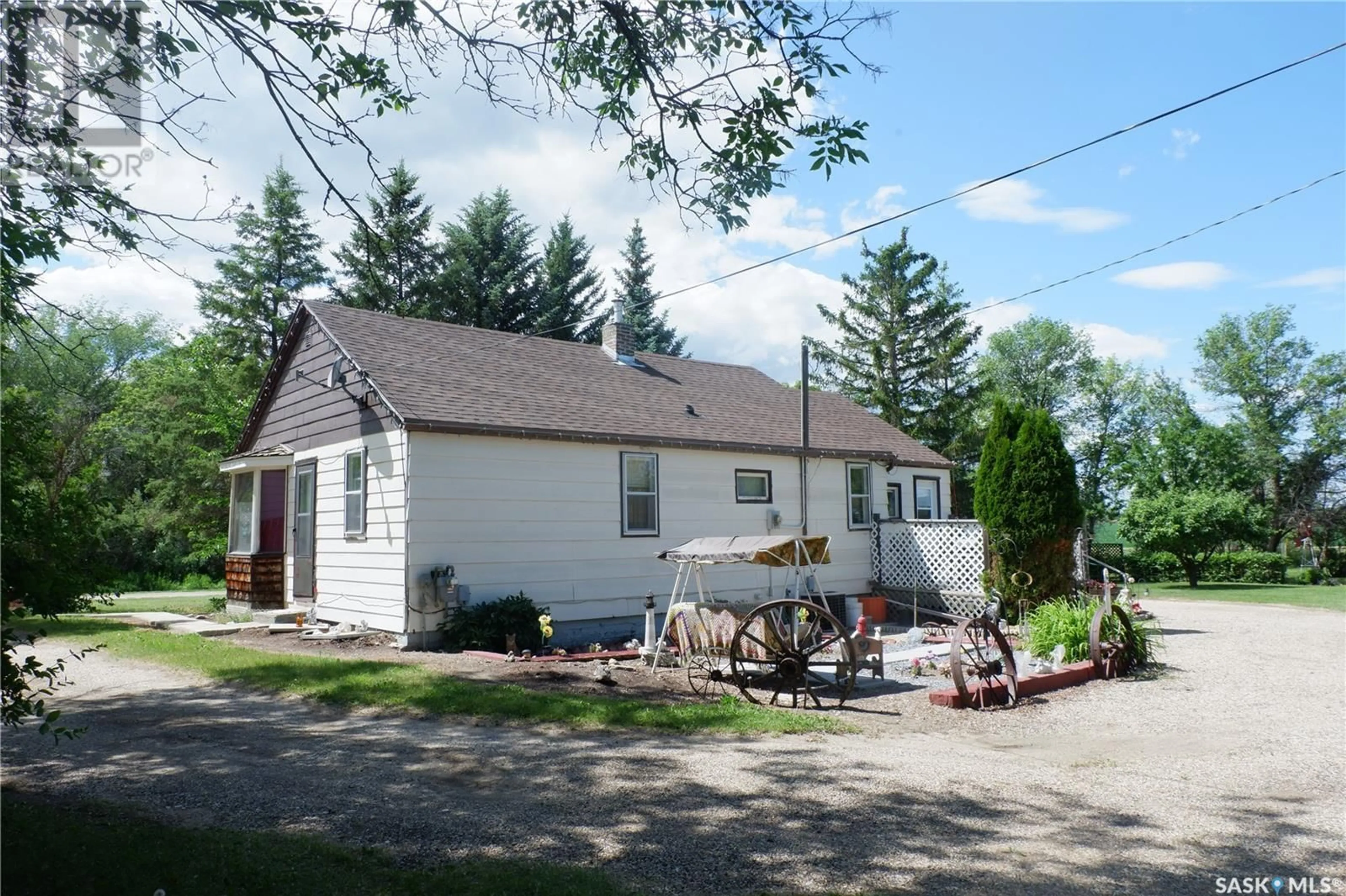 Home with vinyl exterior material, street for 311 KERRY STREET, Limerick Saskatchewan S0H2P0