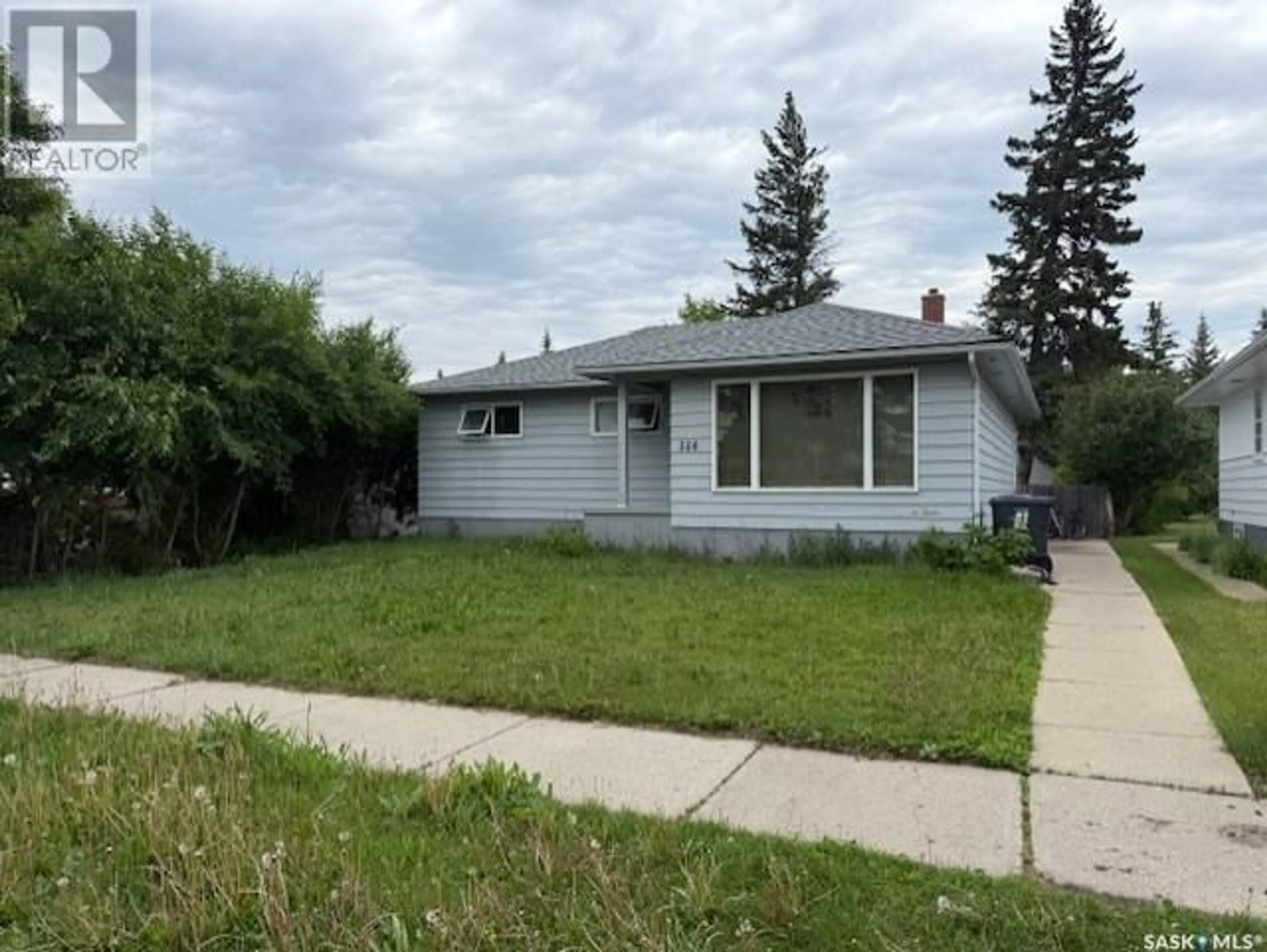 Home with vinyl exterior material, street for 228 8TH AVENUE, Melville Saskatchewan S0A2P0