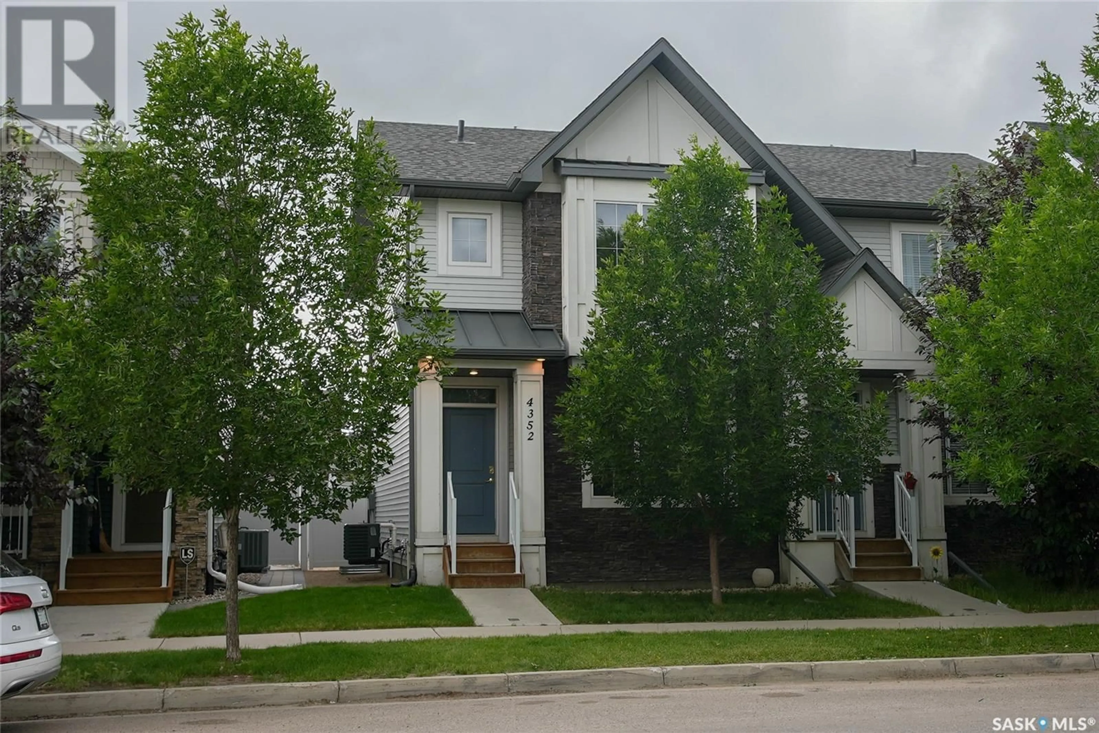 Home with vinyl exterior material, street for 4352 JAMES HILL ROAD, Regina Saskatchewan S4W0R2