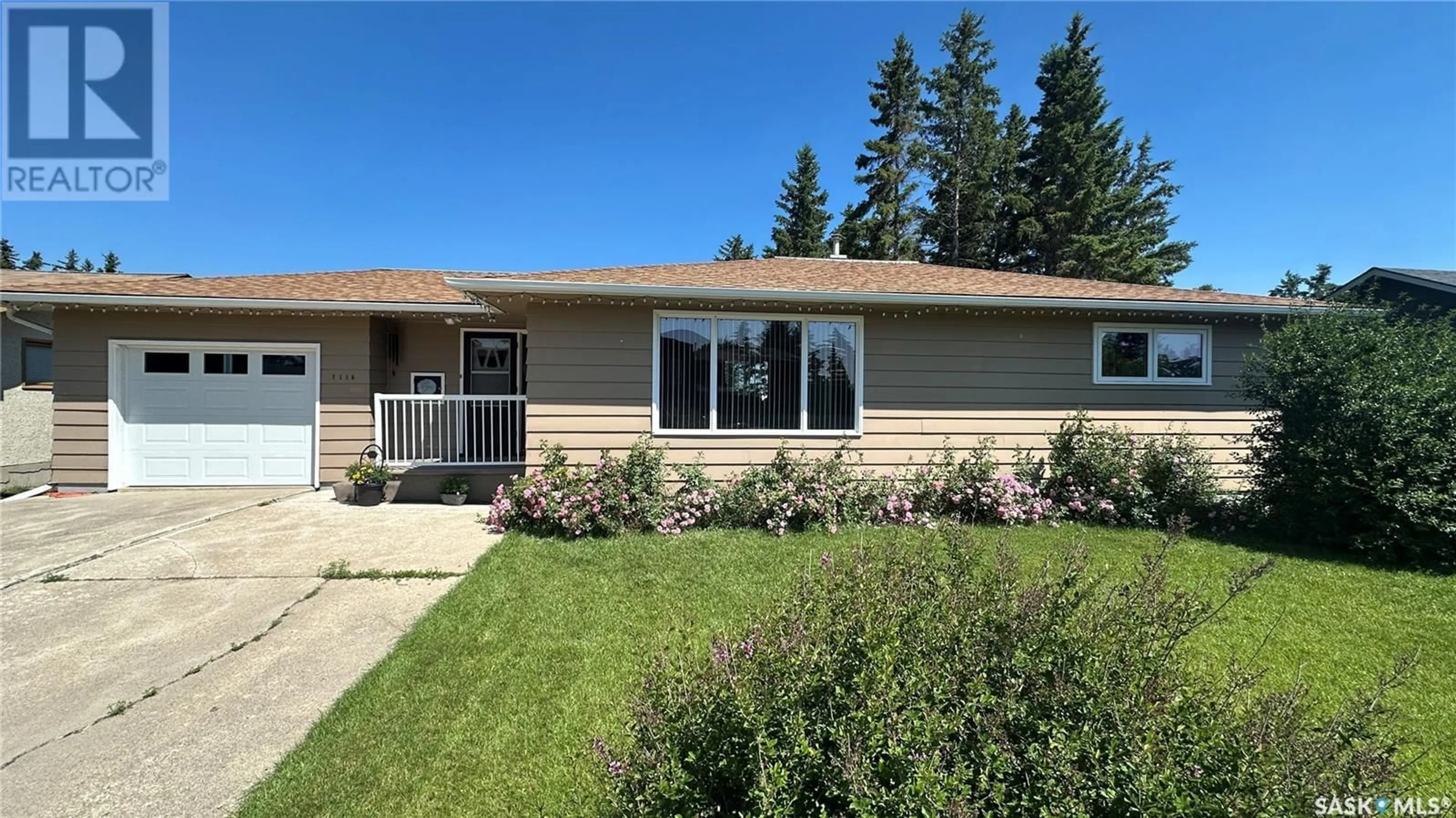 Home with vinyl exterior material, street for 1118 109TH AVENUE, Tisdale Saskatchewan S0E1T0