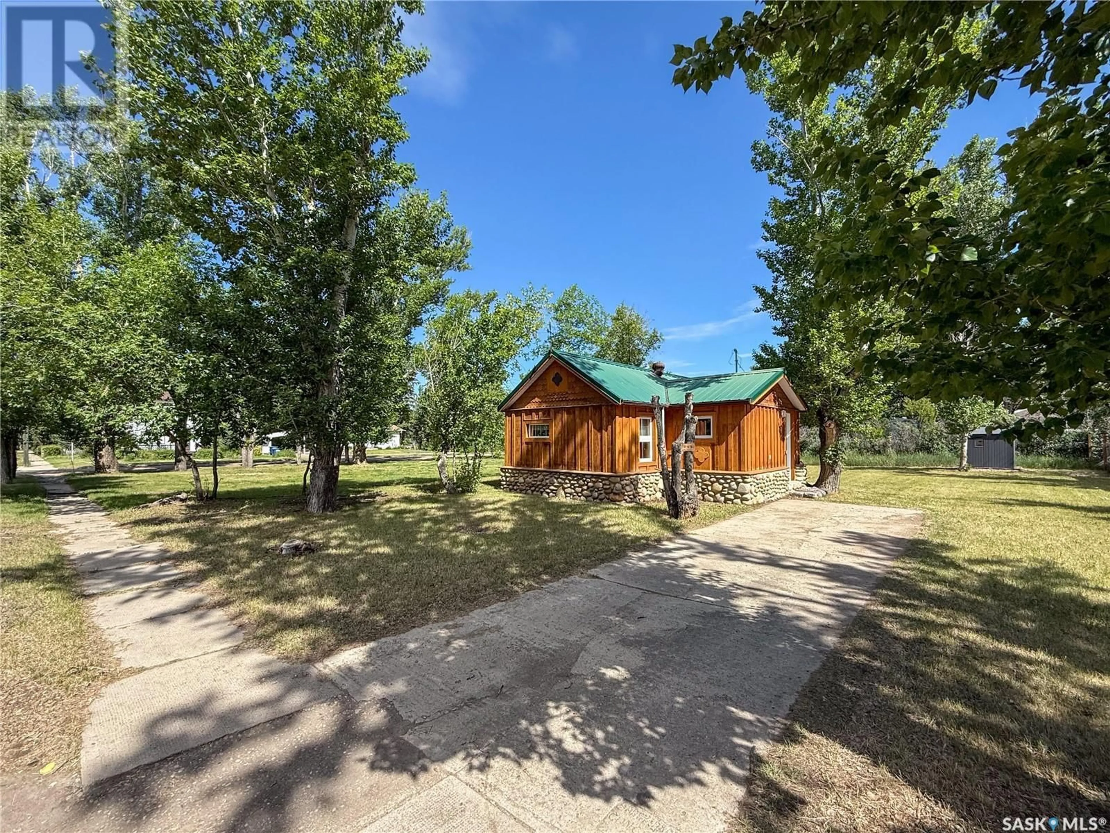 A pic from outside/outdoor area/front of a property/back of a property/a pic from drone, forest/trees view for 541 FRONT STREET, Eastend Saskatchewan S0N1T0
