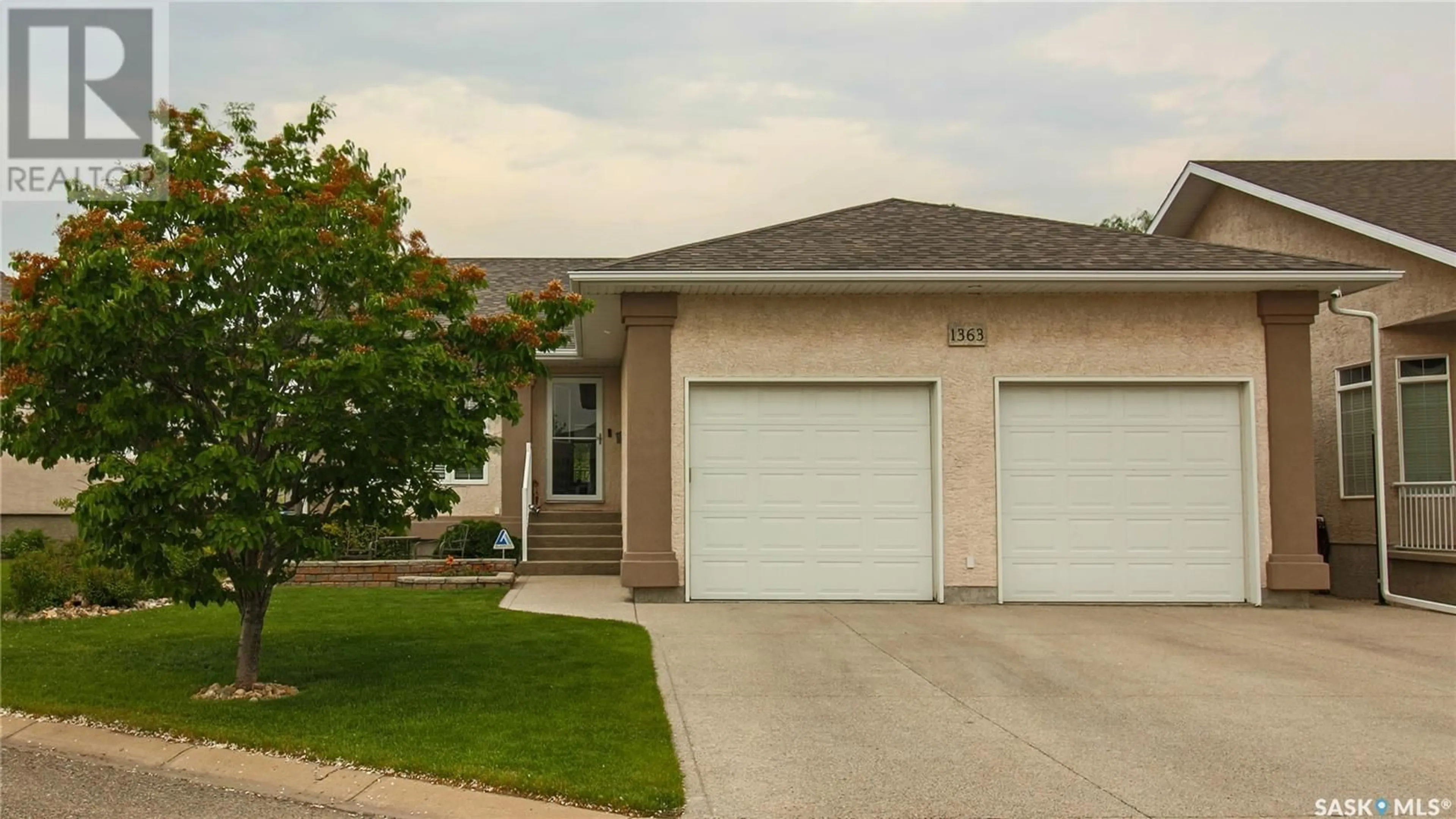 Home with vinyl exterior material, street for 1363 BISSETT PLACE, Regina Saskatchewan S4X4P2