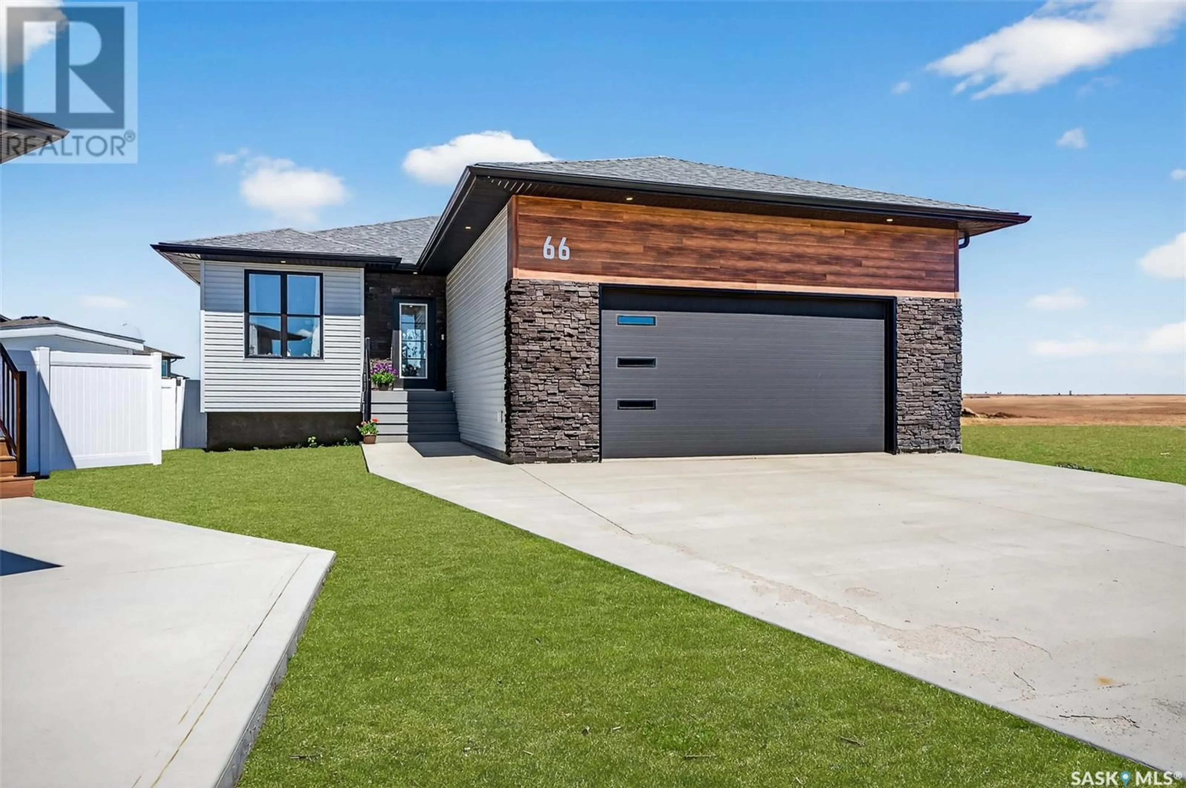 Home with brick exterior material, street for 66 CLUNIE COURT, Moose Jaw Saskatchewan S6J0E3