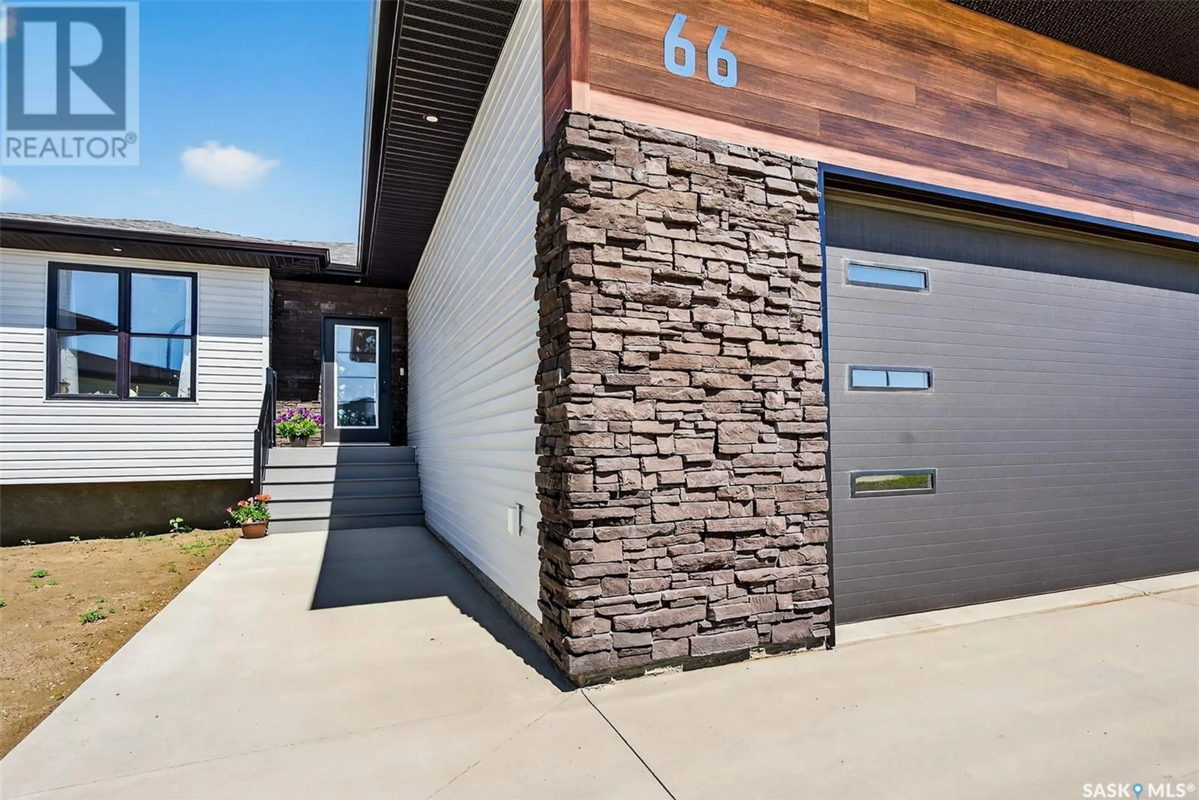 Home with brick exterior material, street for 66 CLUNIE COURT, Moose Jaw Saskatchewan S6J0E3