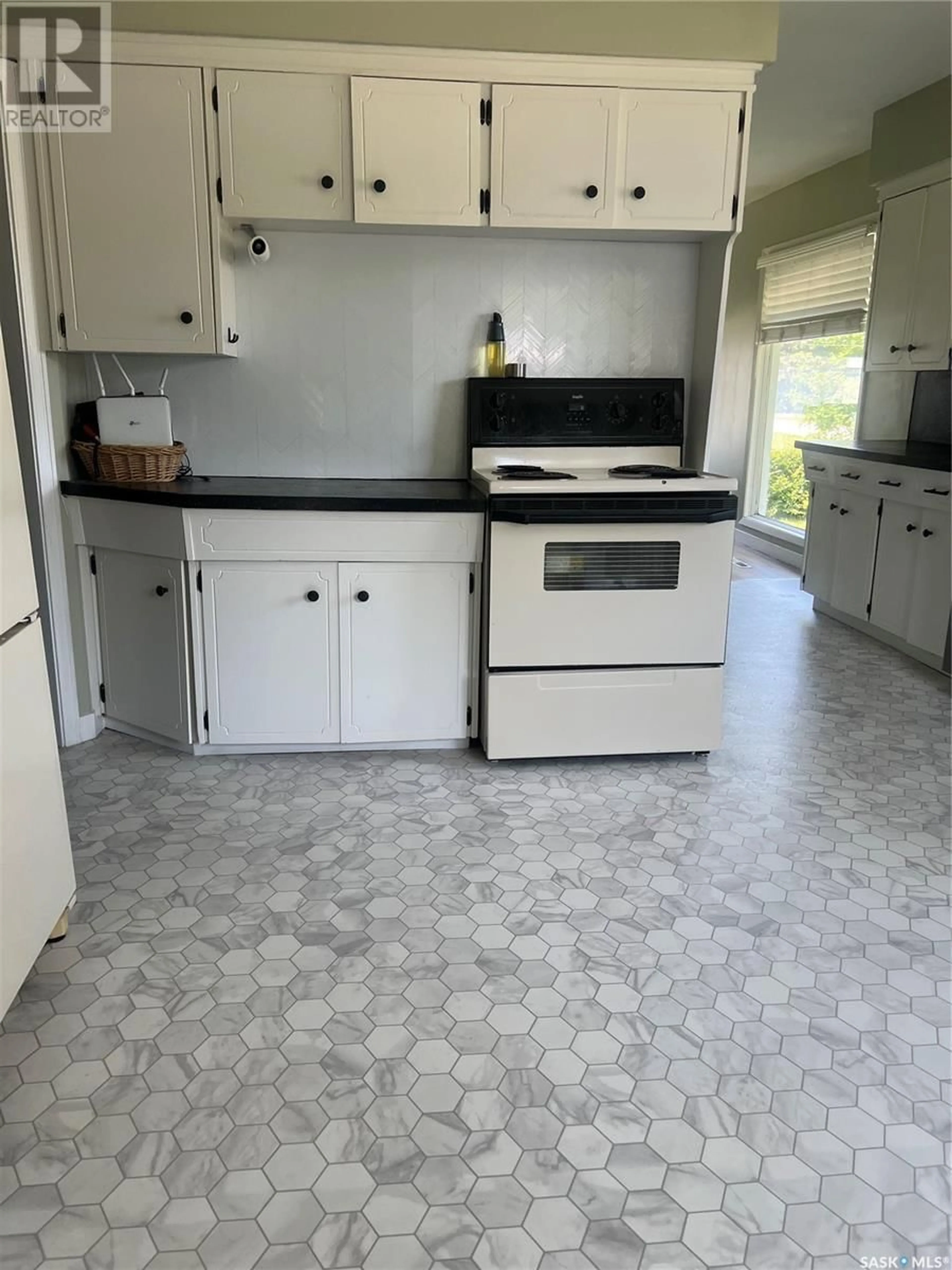 Standard kitchen, ceramic/tile floor for E - 206 2ND AVENUE, Porcupine Plain Saskatchewan S0E1H0