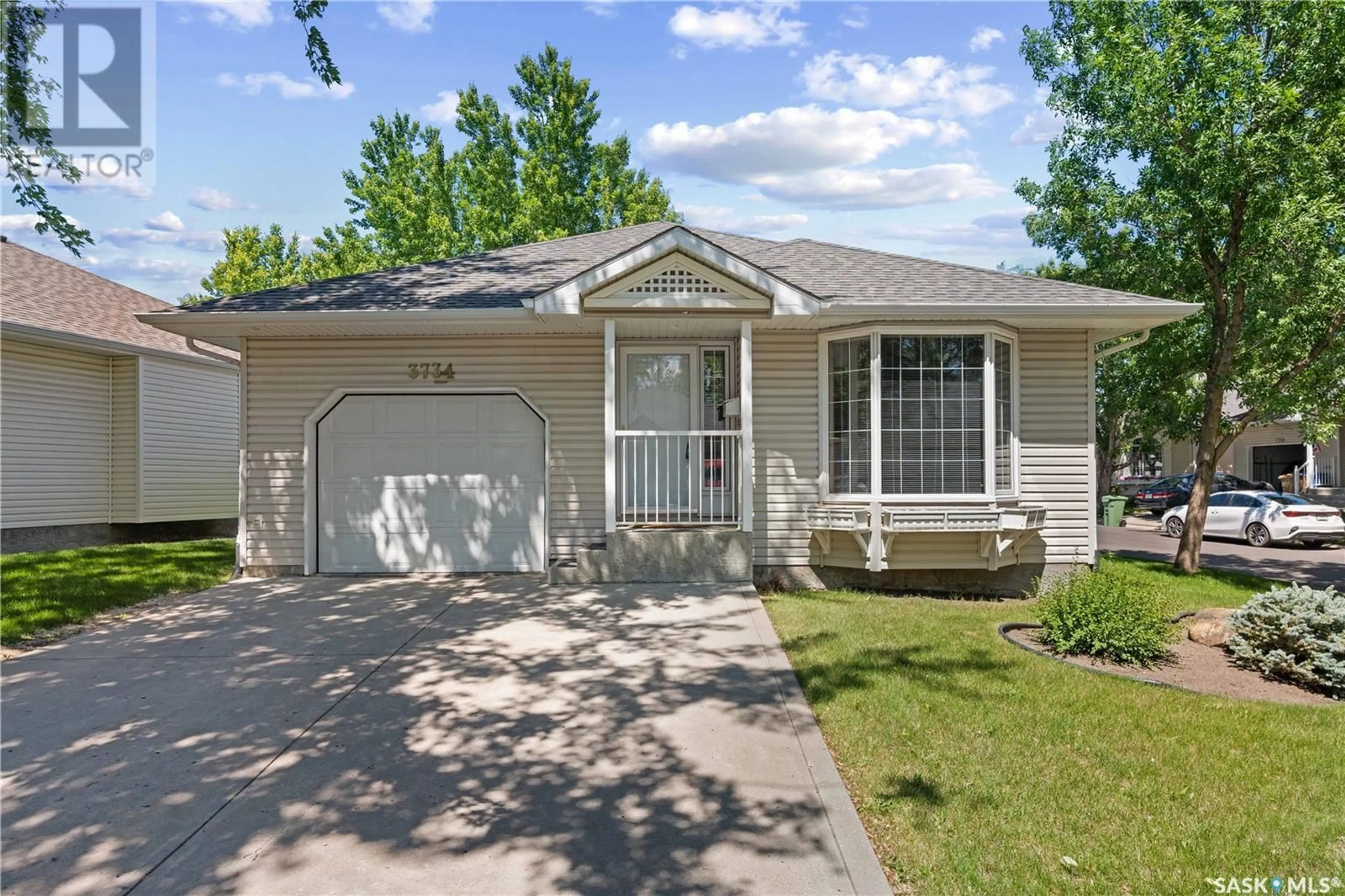 Home with vinyl exterior material, street for 3734 QUEENS GATE, Regina Saskatchewan S4S7J1