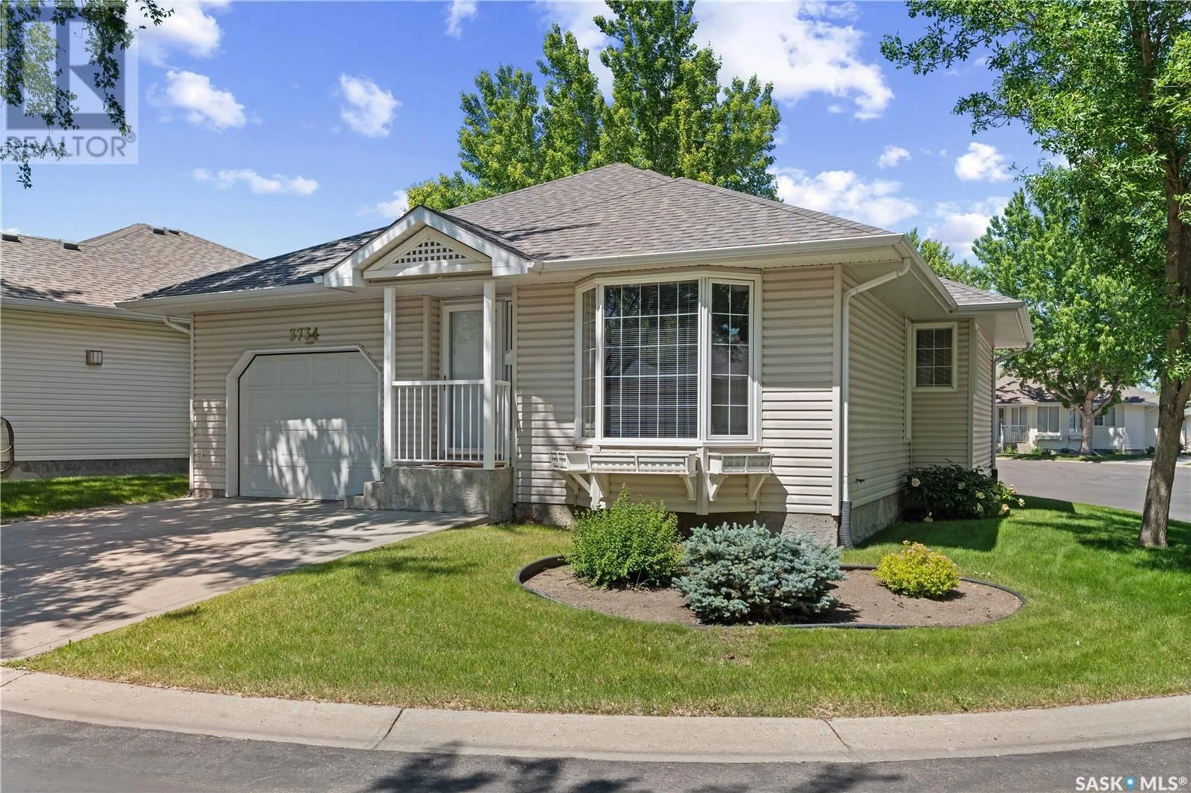 Home with vinyl exterior material, street for 3734 QUEENS GATE, Regina Saskatchewan S4S7J1
