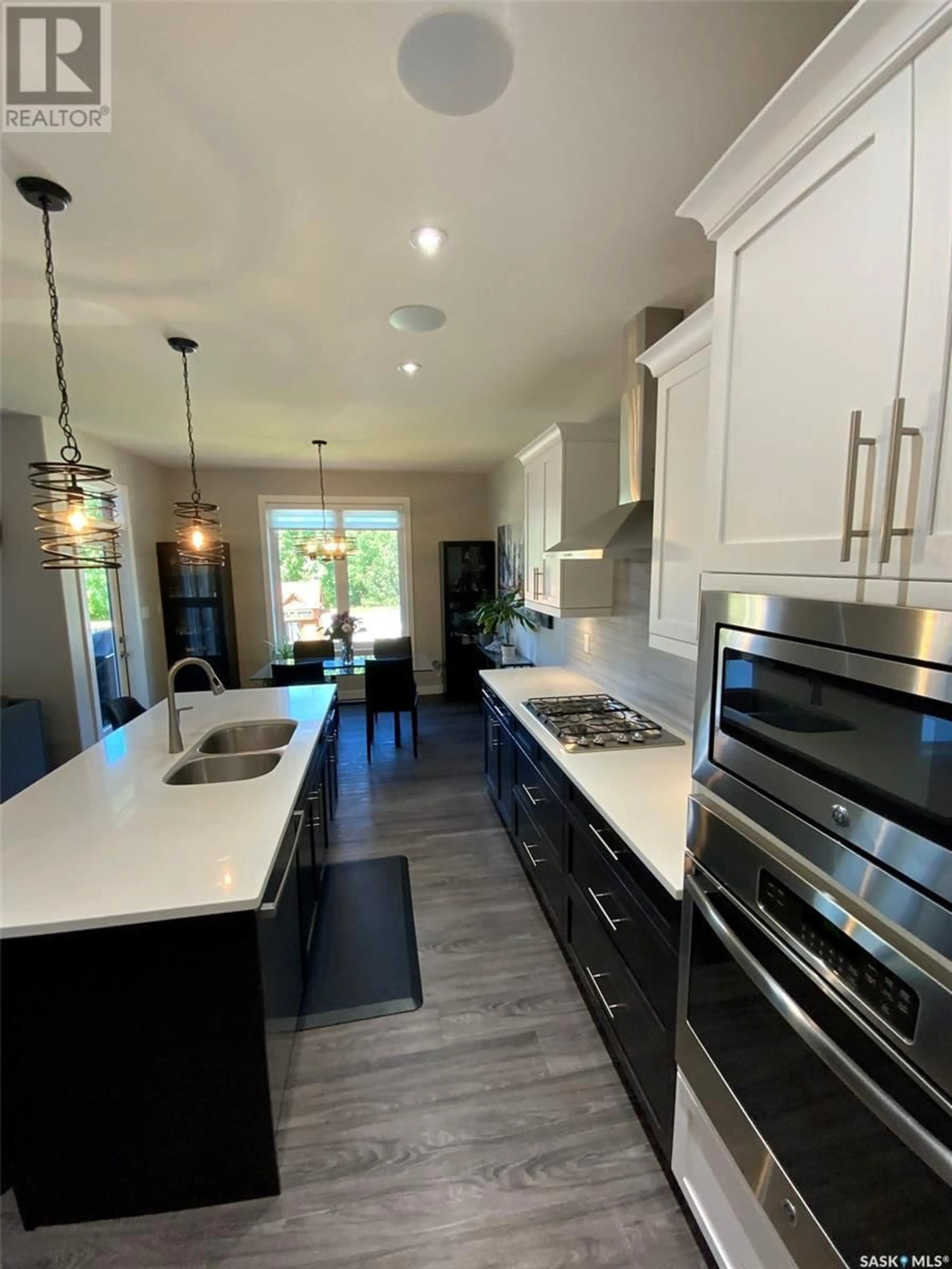 Open concept kitchen, ceramic/tile floor for 3310 GREEN BROOK ROAD, Regina Saskatchewan S4V3K2