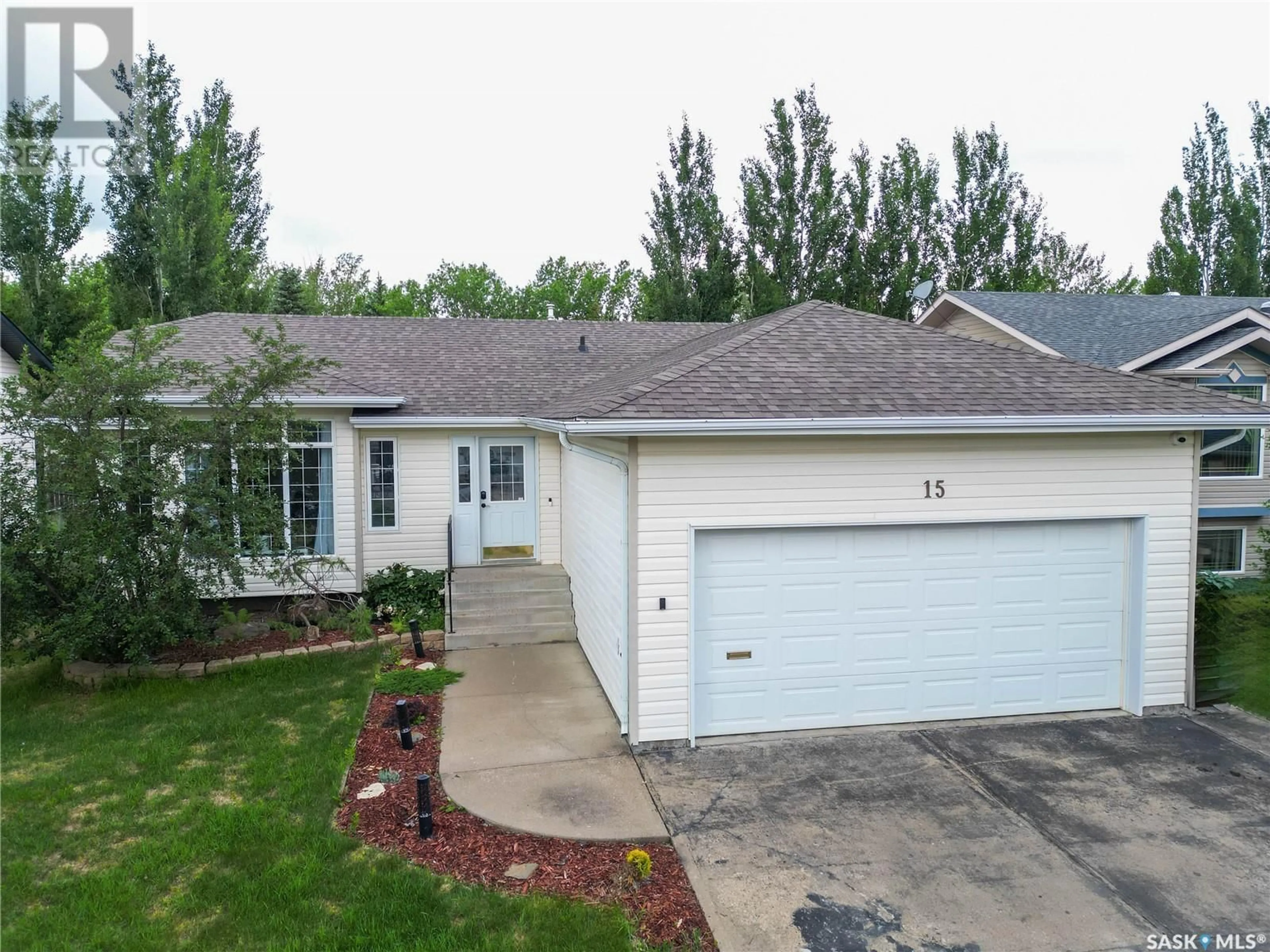 Home with vinyl exterior material, street for 15 TURNER PLACE, Prince Albert Saskatchewan S6X1C4