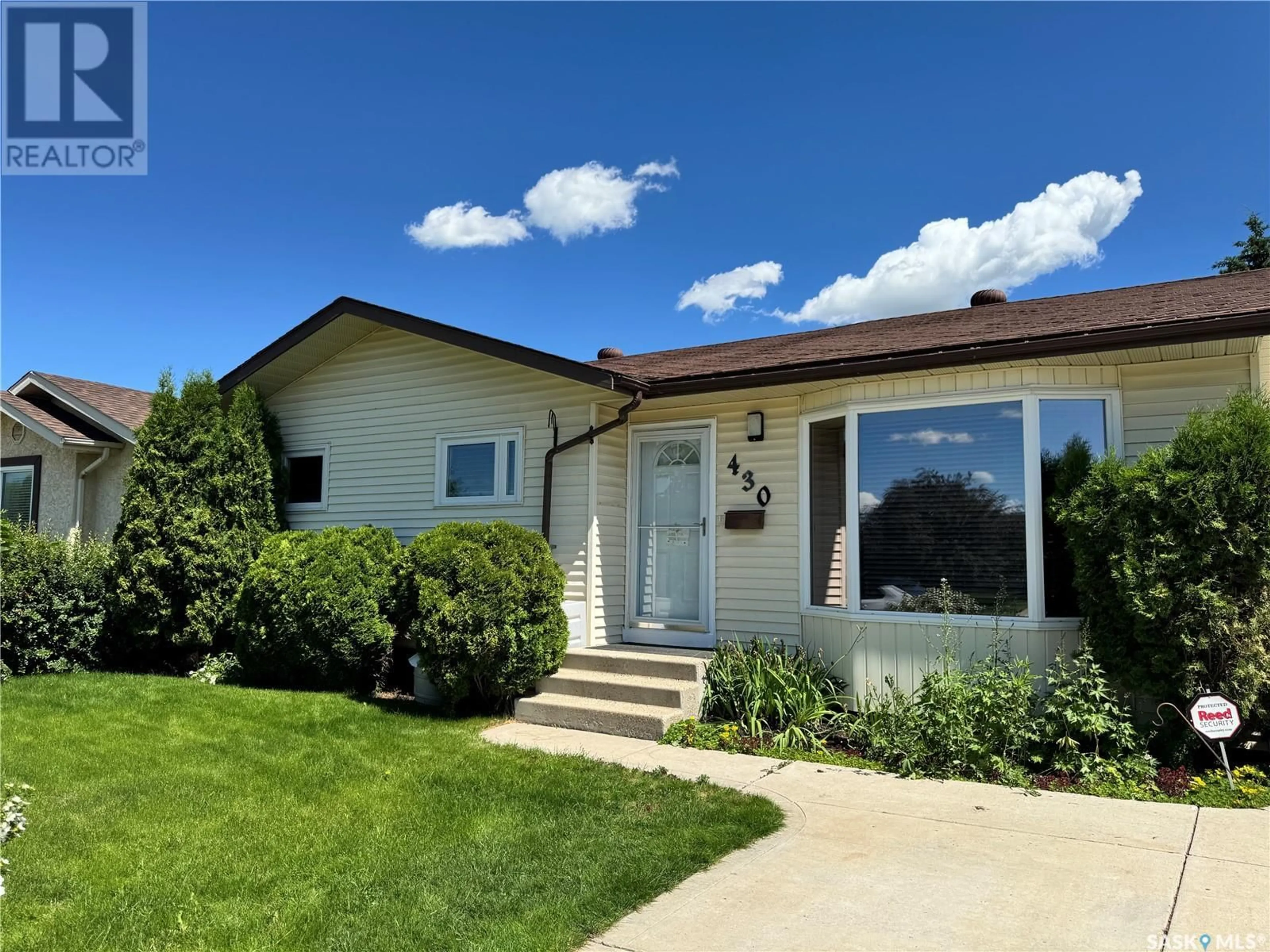 Home with vinyl exterior material, street for 430 KONIHOWSKI ROAD, Saskatoon Saskatchewan S7S1C5
