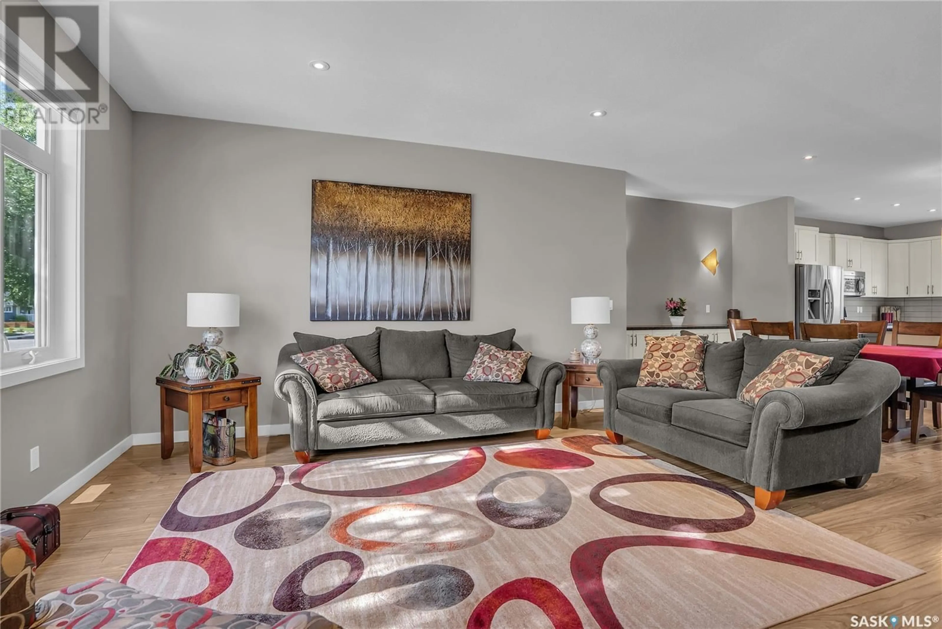 Living room with furniture, carpet floor for 2207 MUNROE AVENUE, Saskatoon Saskatchewan S7J1S2