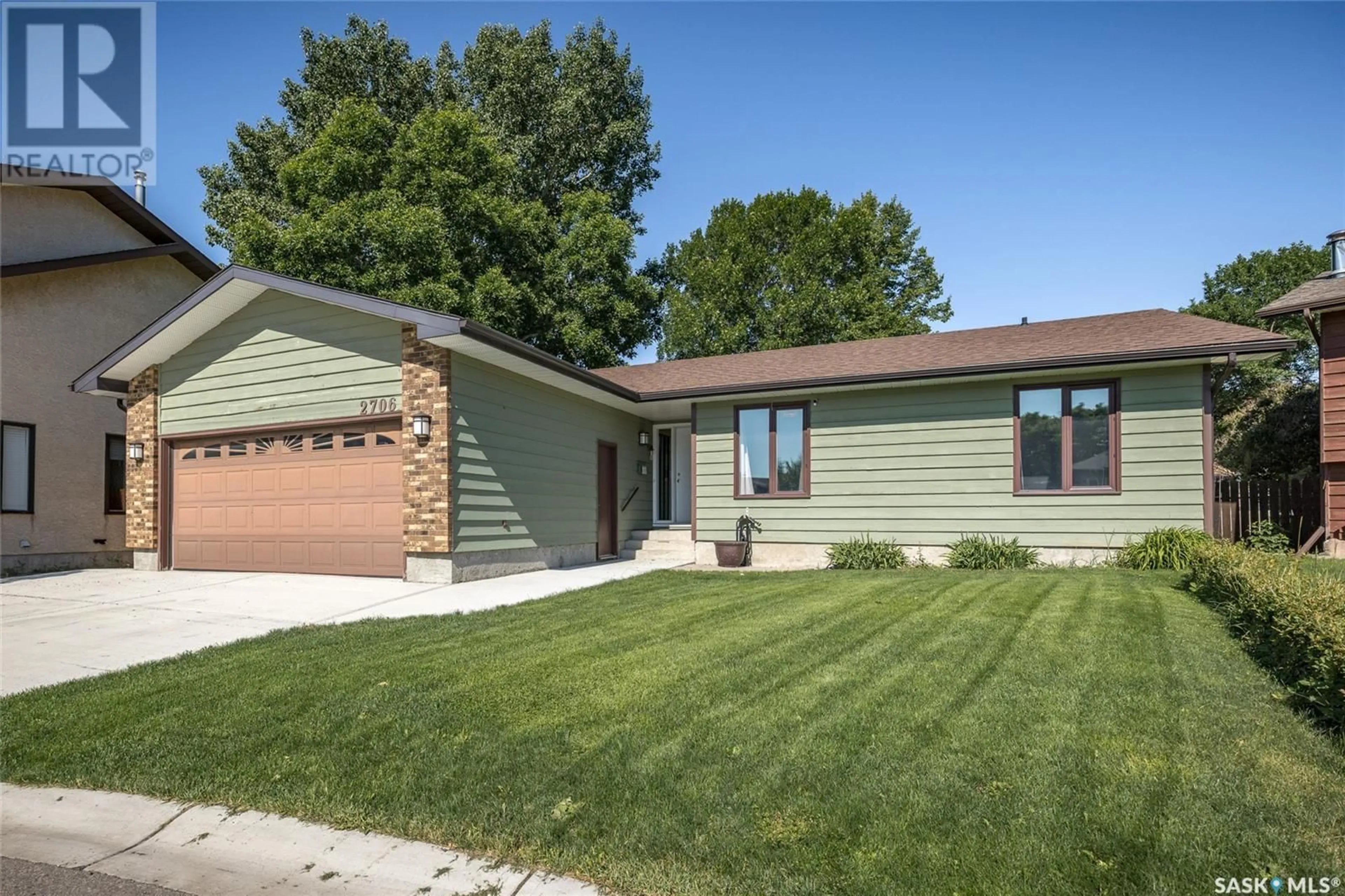 Home with brick exterior material, street for 2706 MCKEOWN PLACE, Regina Saskatchewan S4V1P7