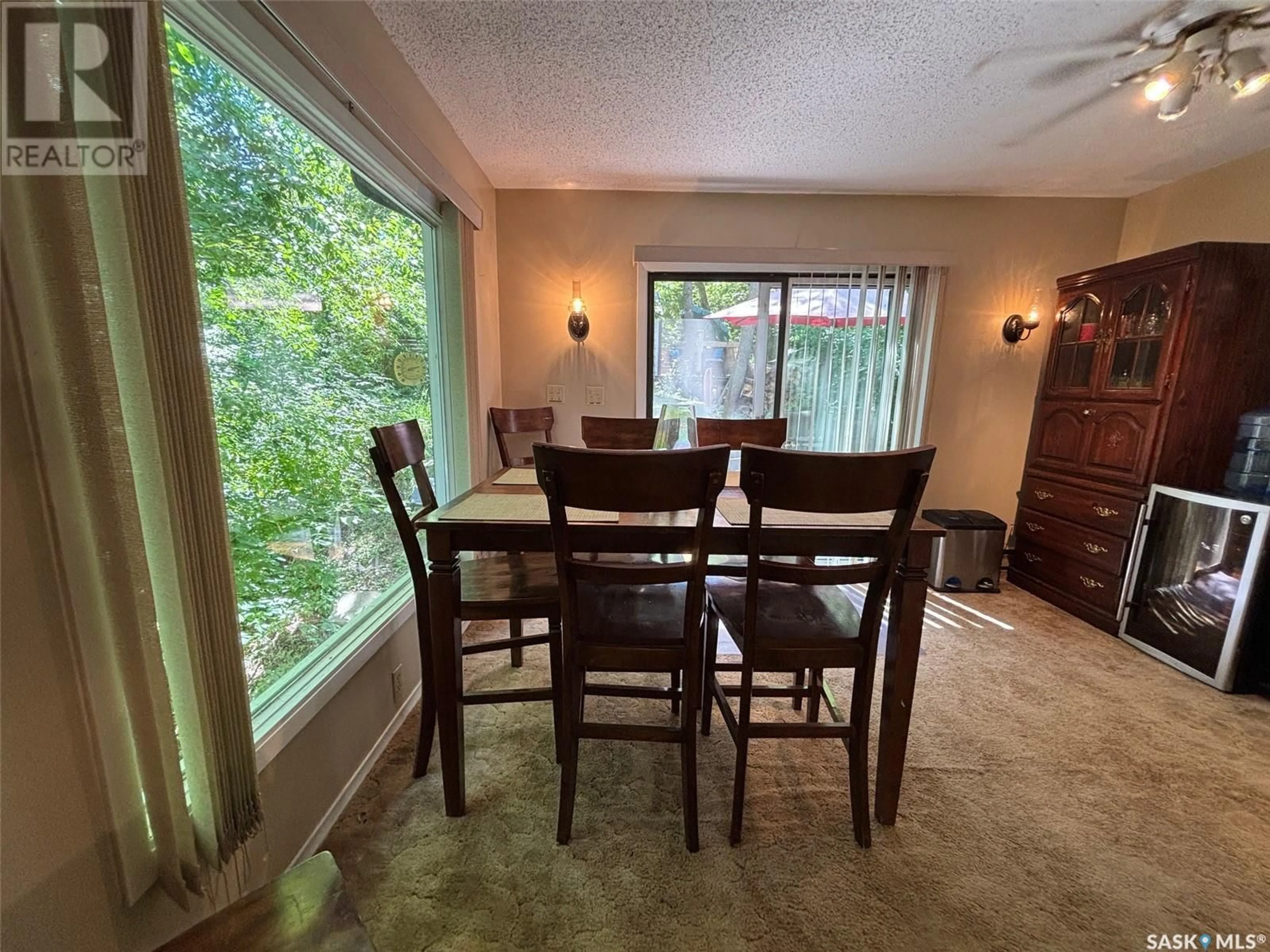 Dining room, wood/laminate floor for 232 GREEN AVENUE, Regina Beach Saskatchewan S0G4C0