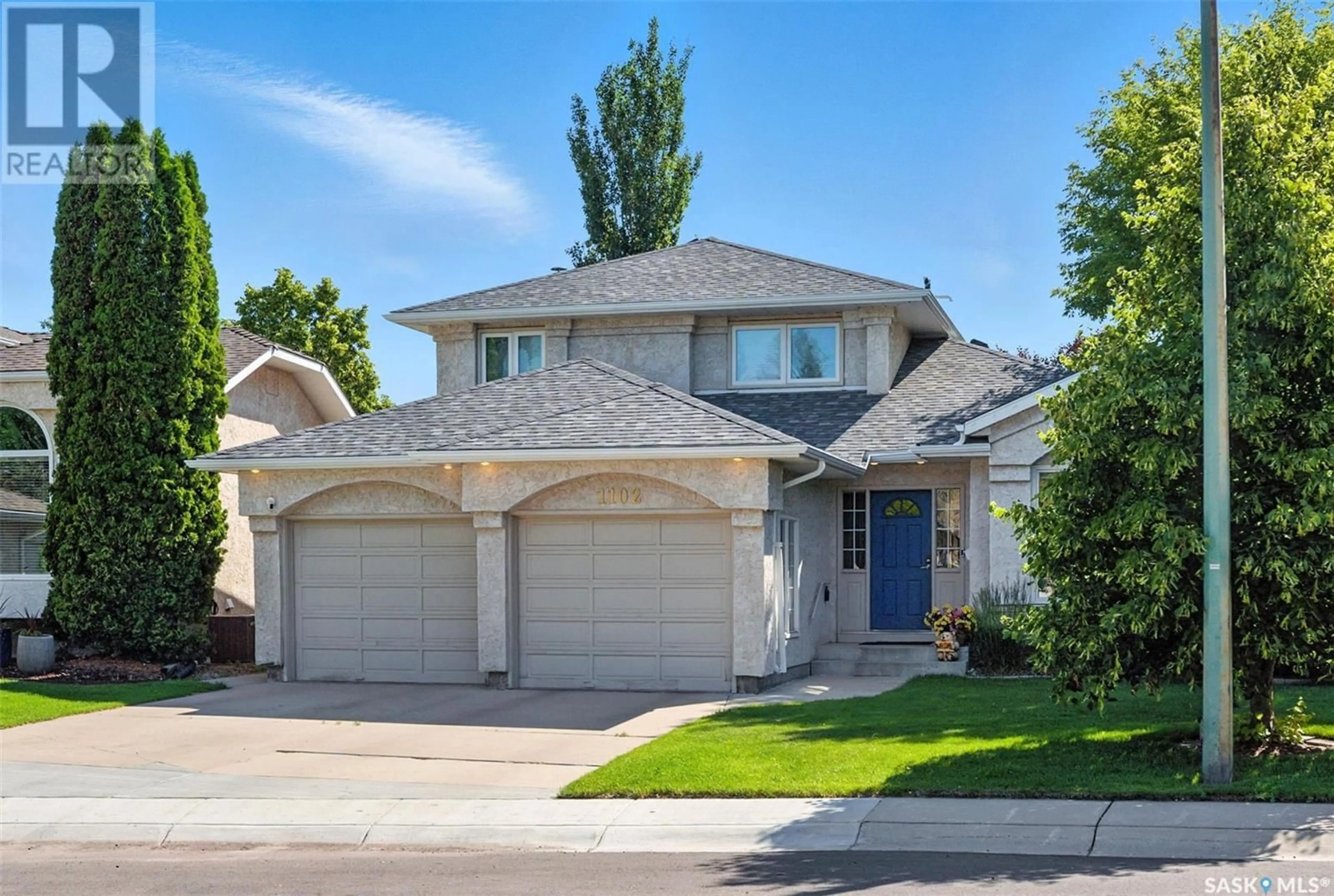 Home with vinyl exterior material, street for 1102 HURLEY WAY, Saskatoon Saskatchewan S7N4J7