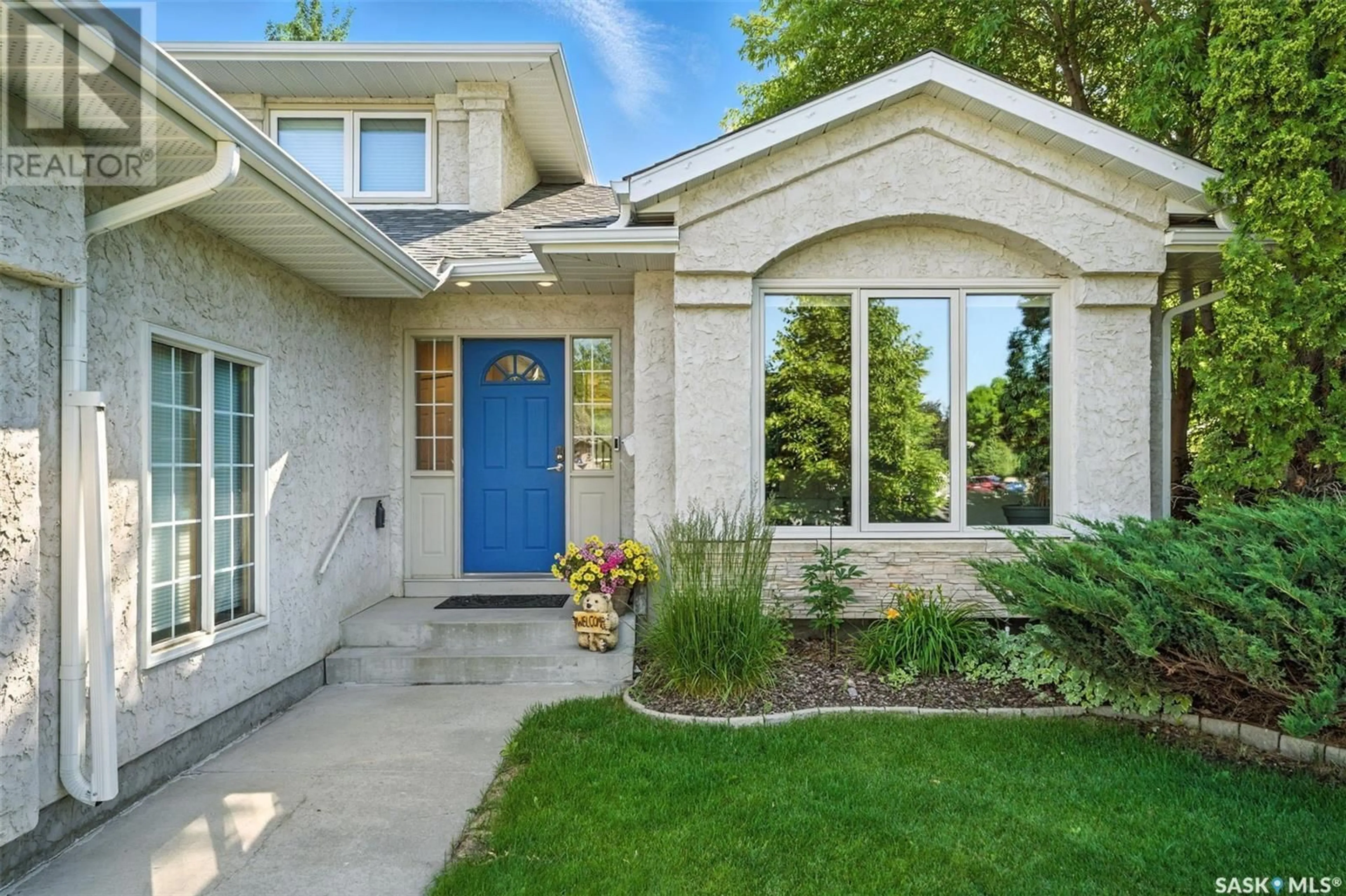 Home with brick exterior material, street for 1102 HURLEY WAY, Saskatoon Saskatchewan S7N4J7