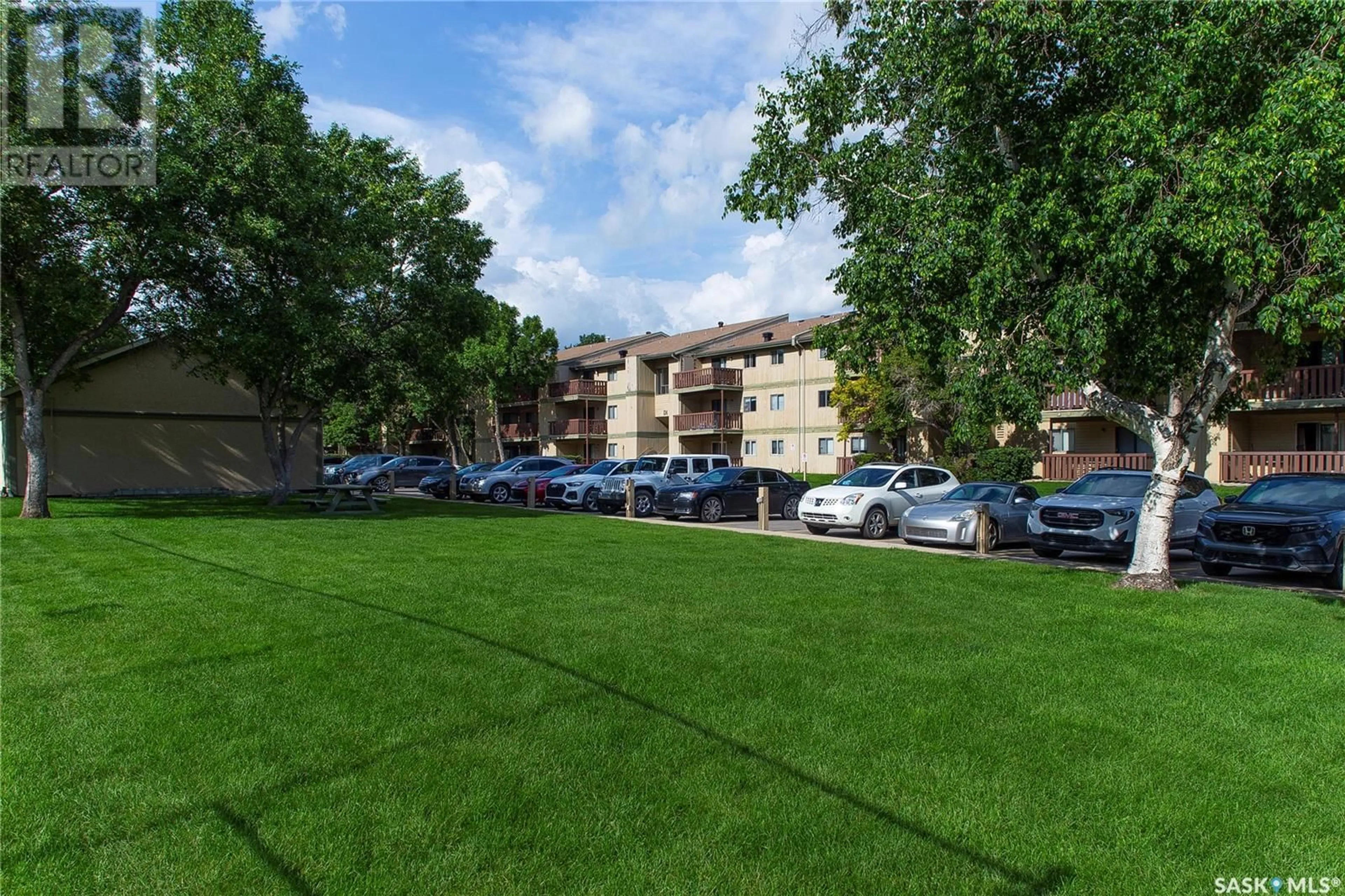 A pic from outside/outdoor area/front of a property/back of a property/a pic from drone, mountain view for D1 - 1121 MCKERCHER DRIVE, Saskatoon Saskatchewan S7H5B8