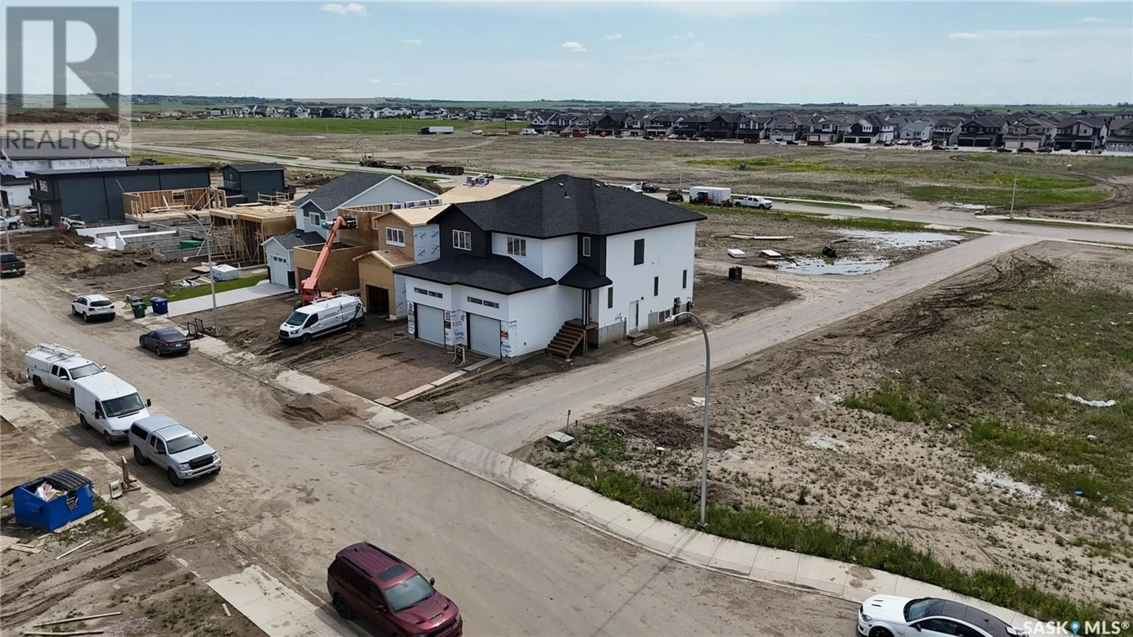 A pic from outside/outdoor area/front of a property/back of a property/a pic from drone, building for 511 SHARMA CRESCENT, Saskatoon Saskatchewan S7W0Y1