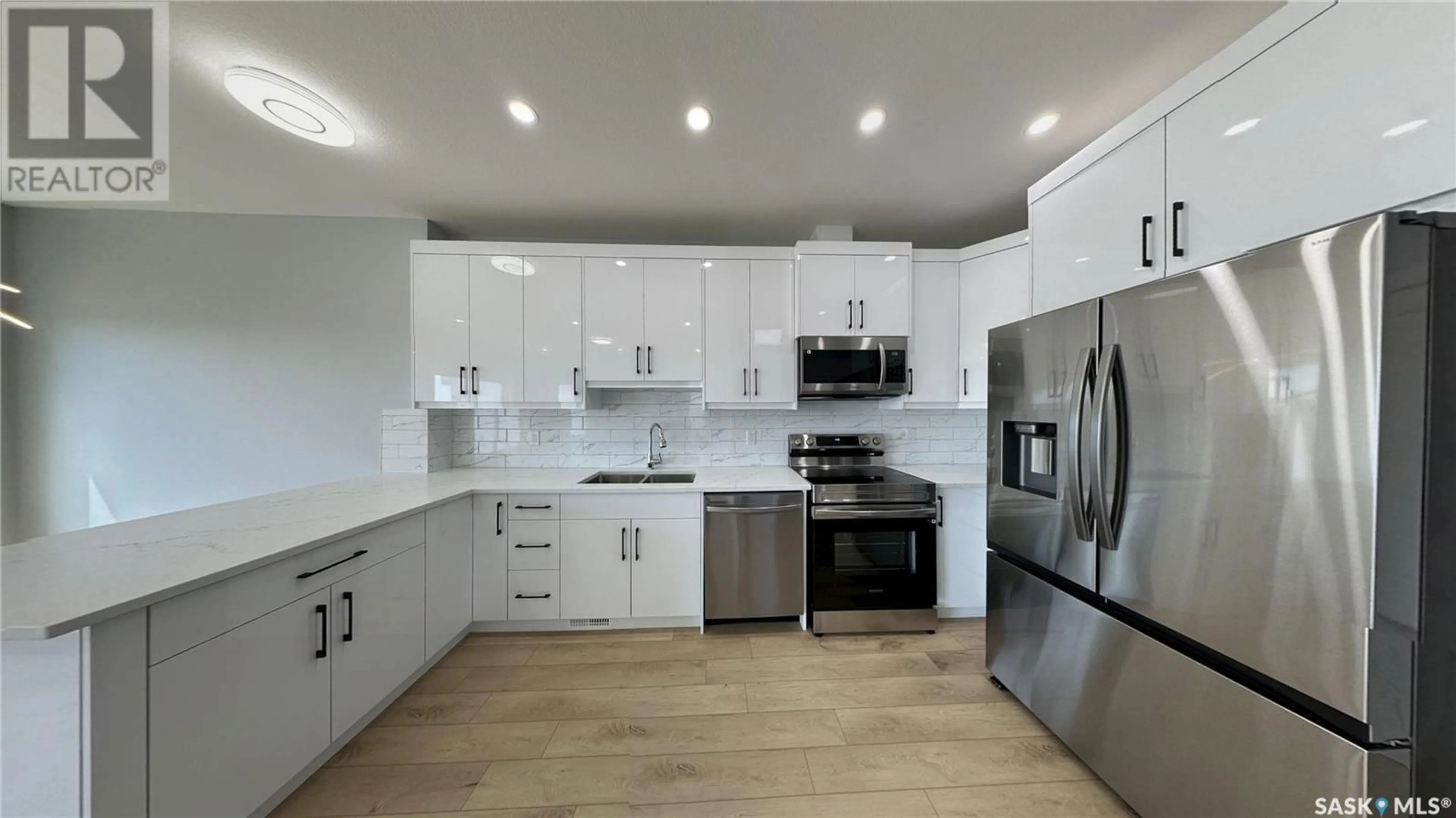 Open concept kitchen, unknown for 511 SHARMA CRESCENT, Saskatoon Saskatchewan S7W0Y1