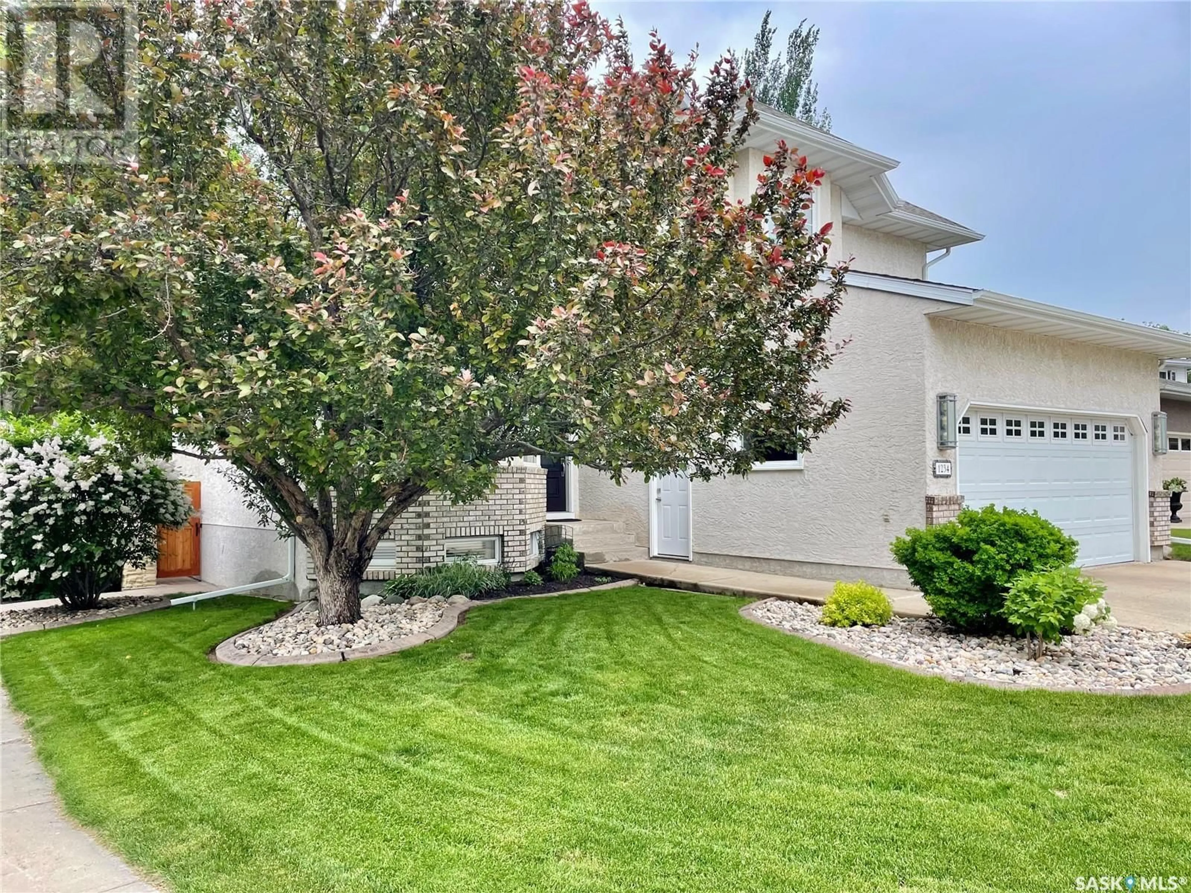A pic from outside/outdoor area/front of a property/back of a property/a pic from drone, street for 1234 YOUNGSON PLACE, Regina Saskatchewan S4X4K4