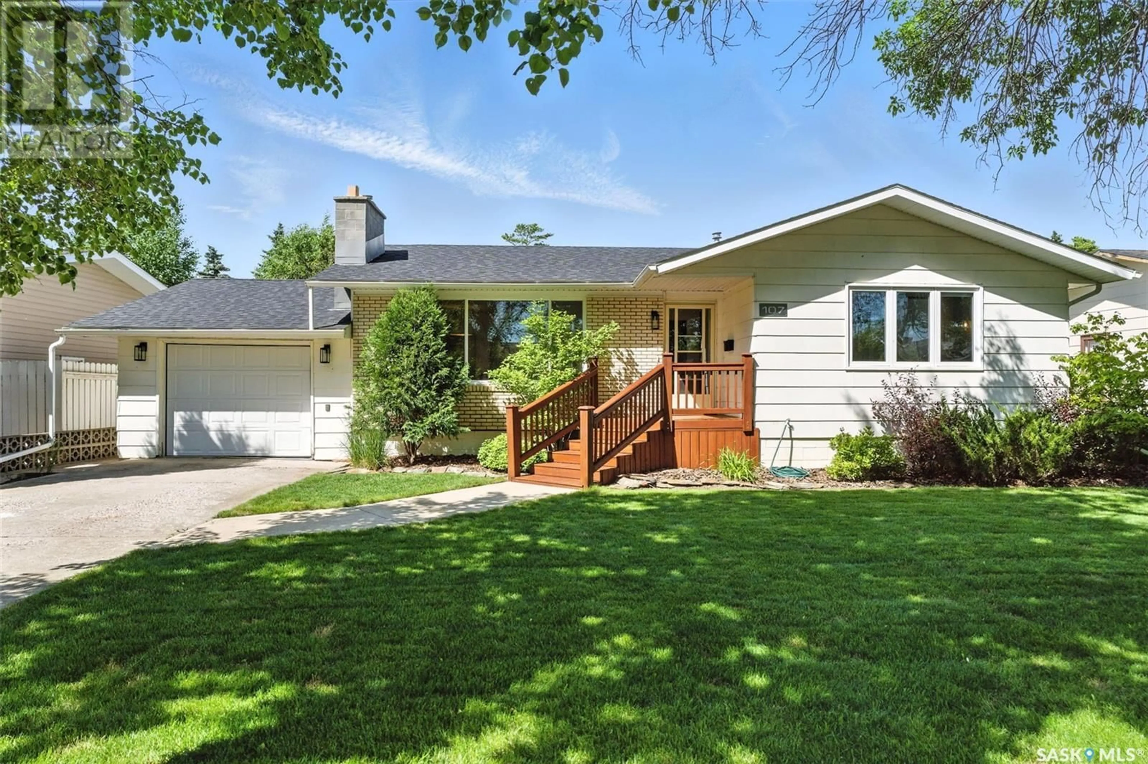 Home with vinyl exterior material, street for 107 4TH STREET, Langham Saskatchewan S0K2L0