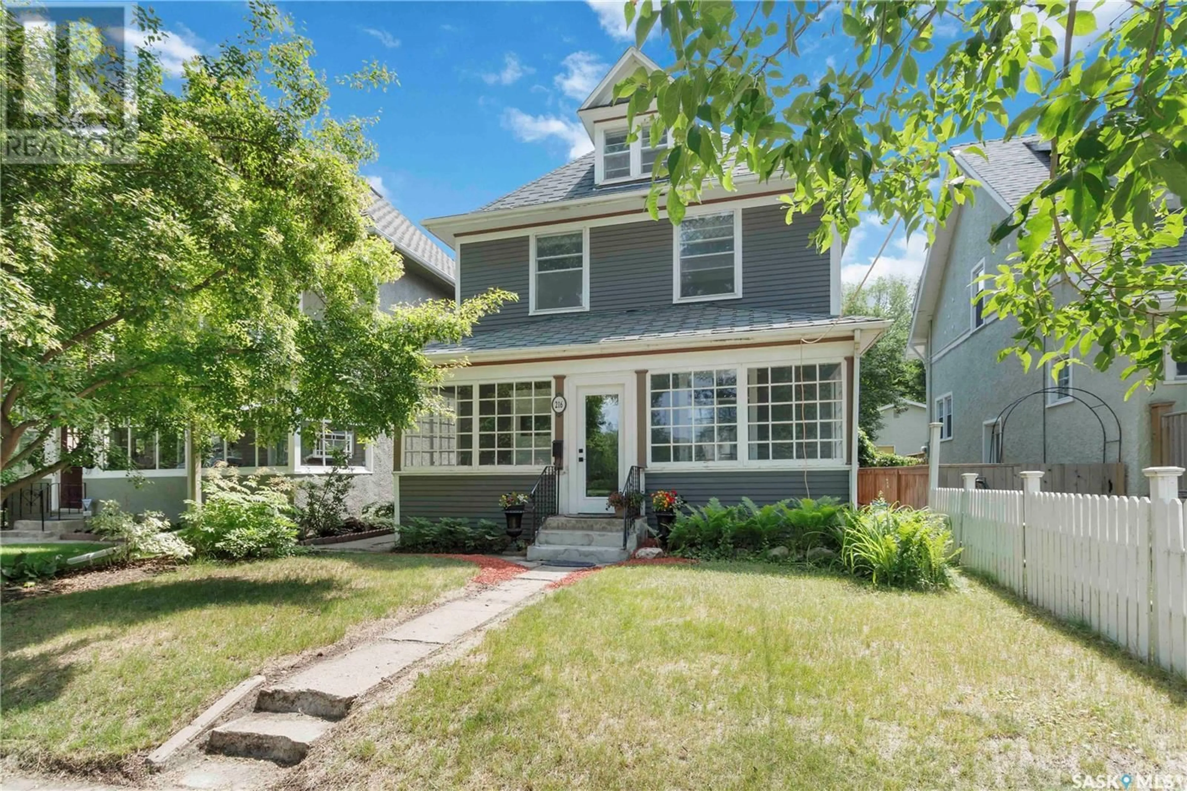Home with vinyl exterior material, street for 216 8TH STREET, Saskatoon Saskatchewan S7H0P3