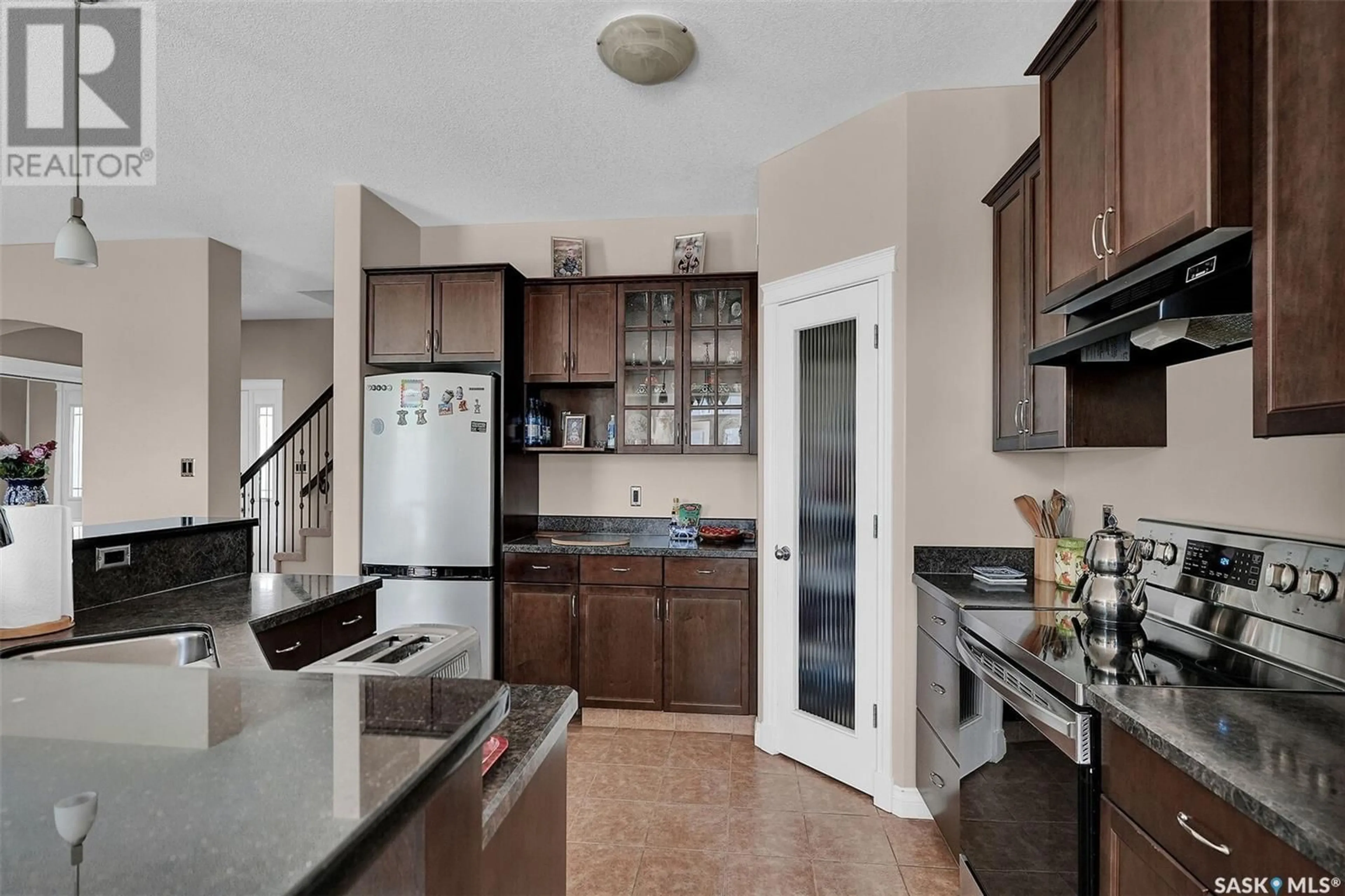 Open concept kitchen, ceramic/tile floor for 4847 BETKER PLACE, Regina Saskatchewan S4X4T8