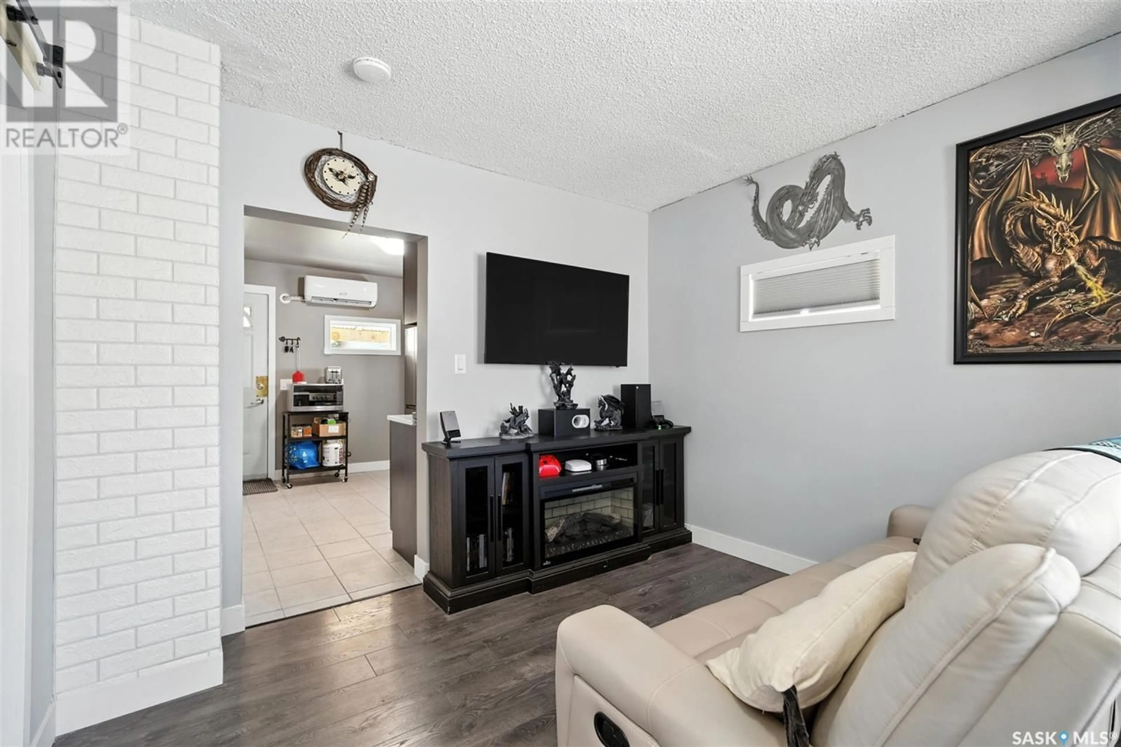Living room with furniture, unknown for 212 K AVENUE, Saskatoon Saskatchewan S7M2C8