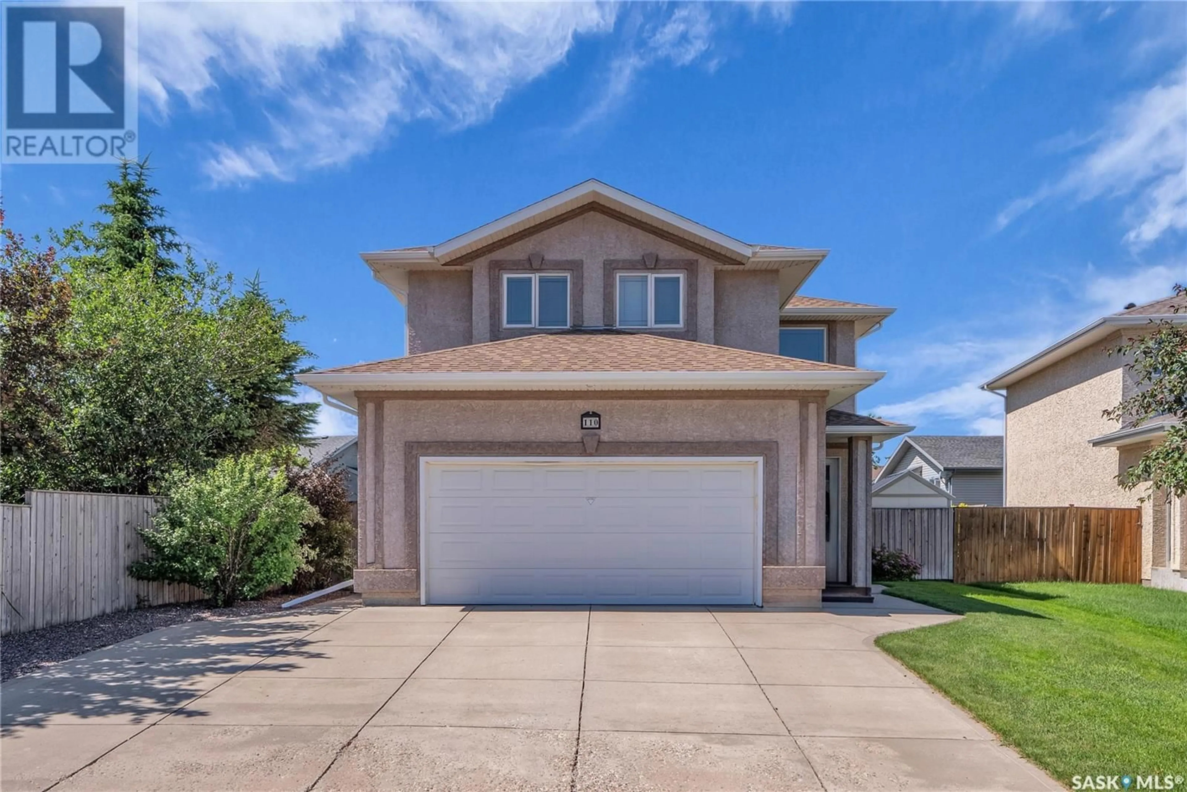 Home with vinyl exterior material, street for 110 SEARS COVE, Saskatoon Saskatchewan S7N4V5