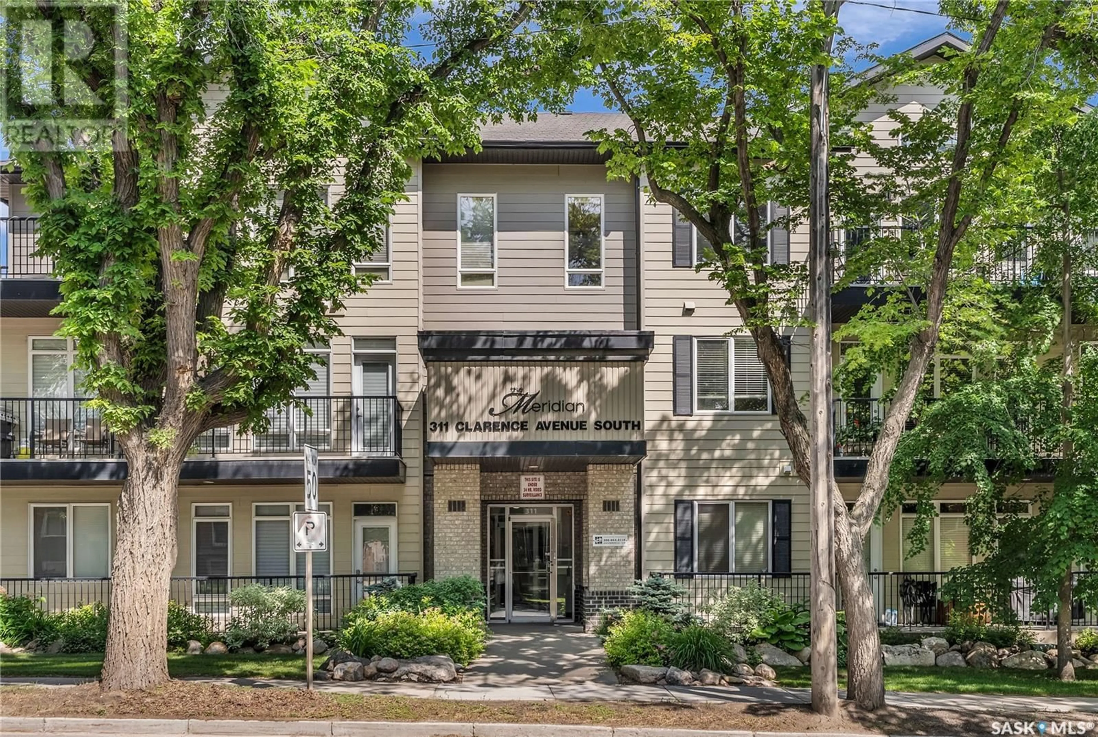 Home with brick exterior material, street for 311 - 201 CLARENCE AVENUE, Saskatoon Saskatchewan S7N1H5