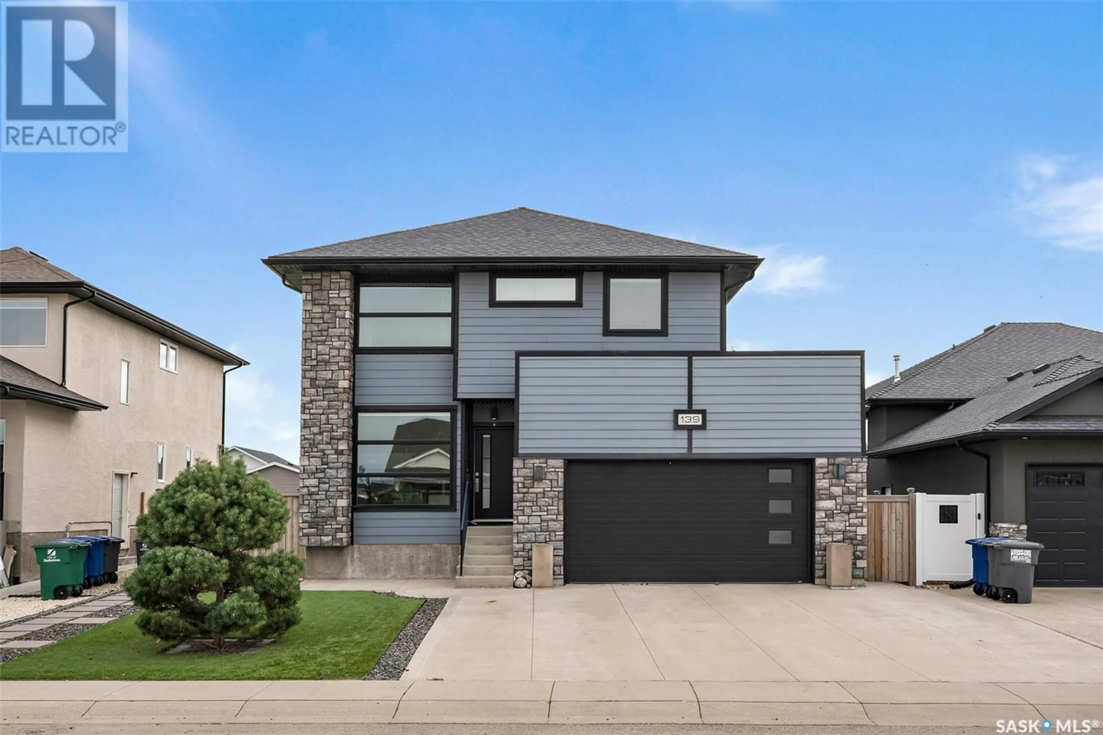 Home with brick exterior material, street for 139 JOHNS ROAD, Saskatoon Saskatchewan S7W0L2