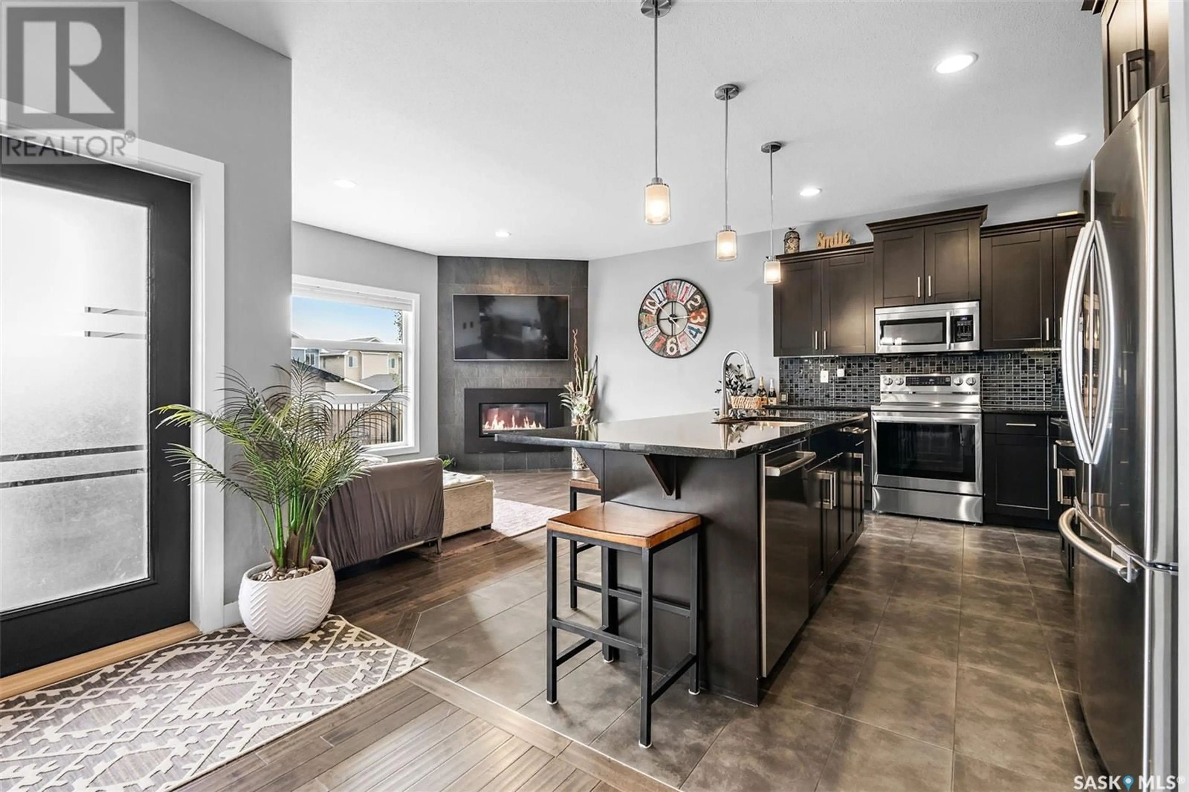 Open concept kitchen, ceramic/tile floor for 139 JOHNS ROAD, Saskatoon Saskatchewan S7W0L2