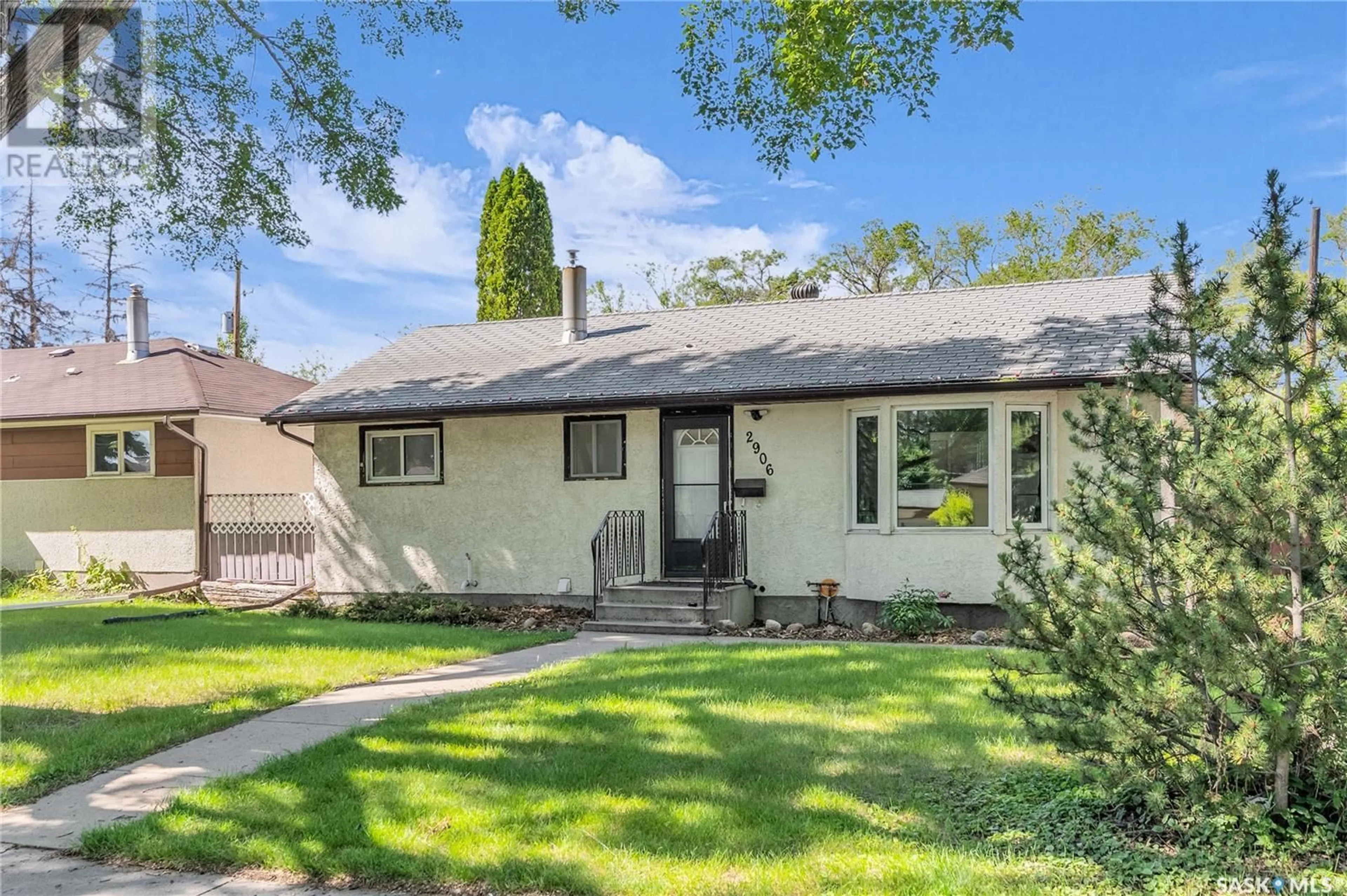 Home with vinyl exterior material, street for 2906 21ST STREET, Saskatoon Saskatchewan S7M0W5