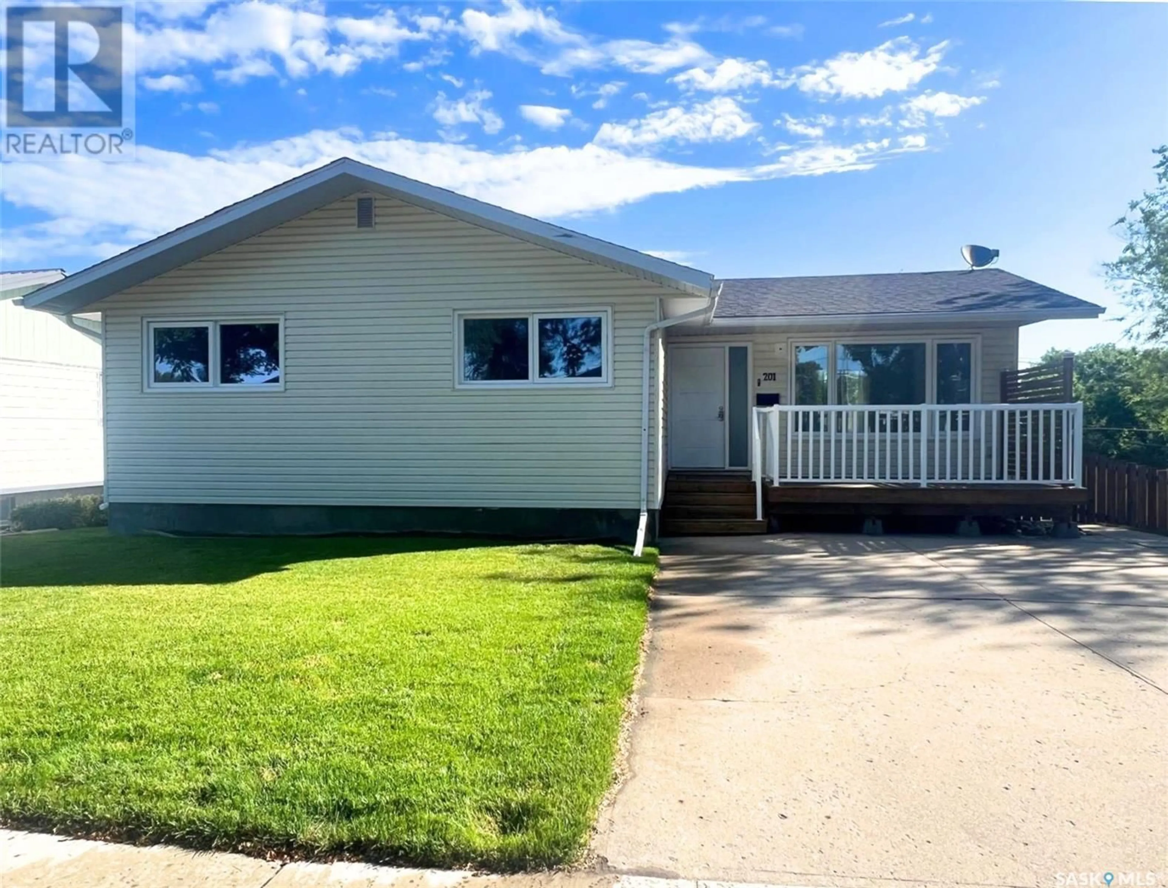 Home with vinyl exterior material, street for 201 CONLIN DRIVE, Swift Current Saskatchewan S9H3A9
