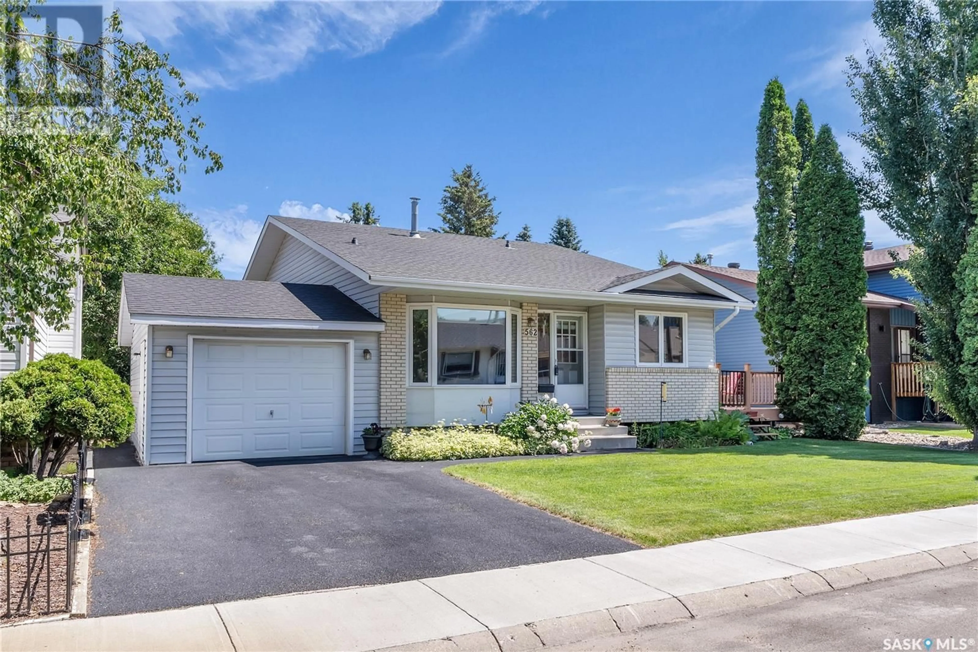 Home with vinyl exterior material, street for 562 WOLLASTON TERRACE, Saskatoon Saskatchewan S7J4H2