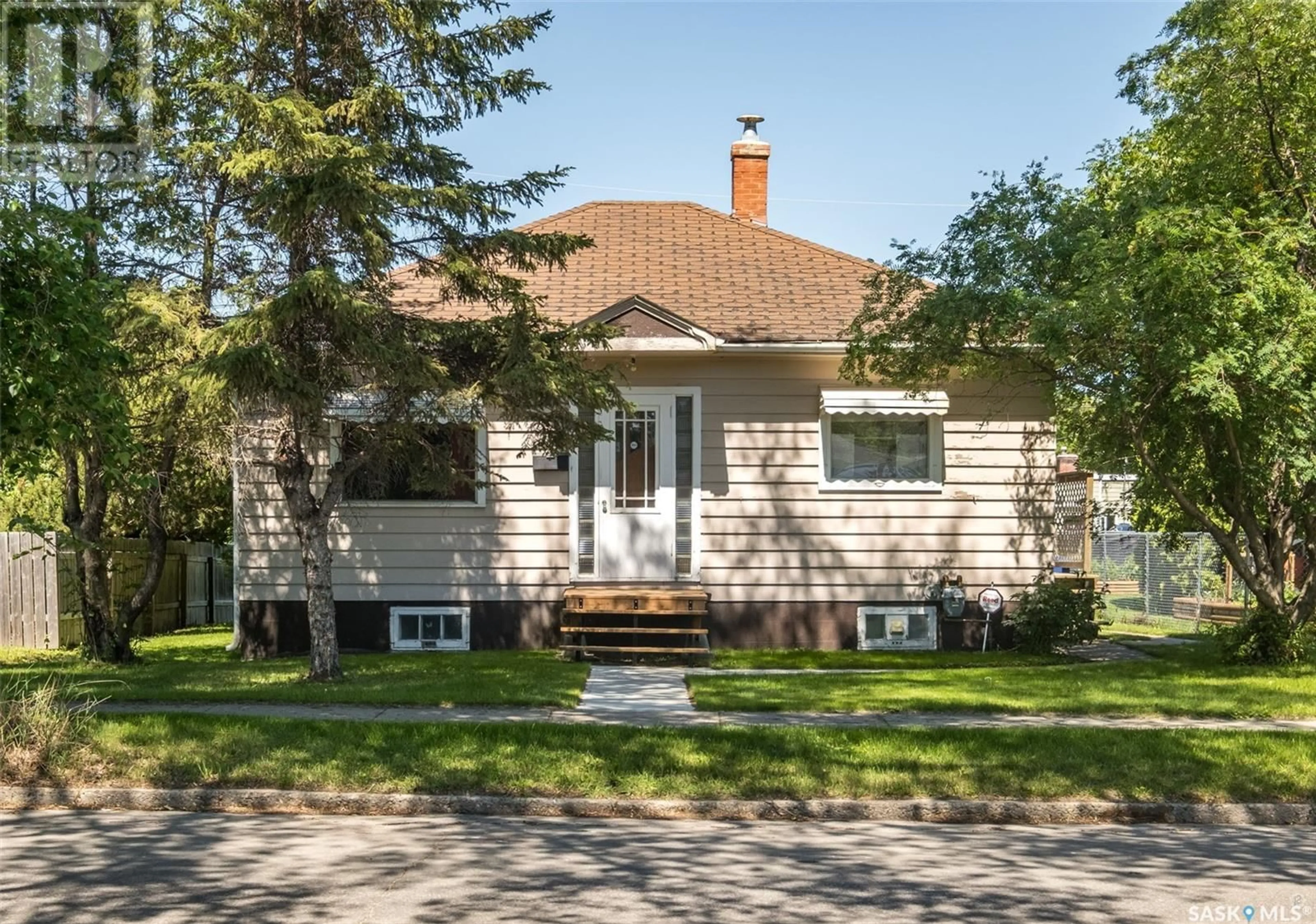 Home with vinyl exterior material, street for 26 22ND STREET, Prince Albert Saskatchewan S6V1M9